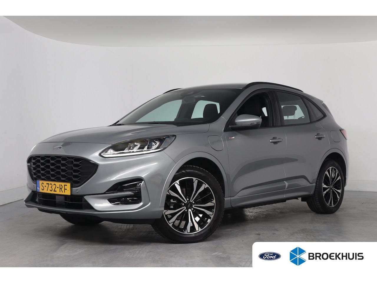 Ford Kuga - 2.5 PHEV ST-Line | 1e Eigenaar! | SOH 98% | Dealer Onderhouden! | Trekhaak | Camera | Navi - AutoWereld.nl