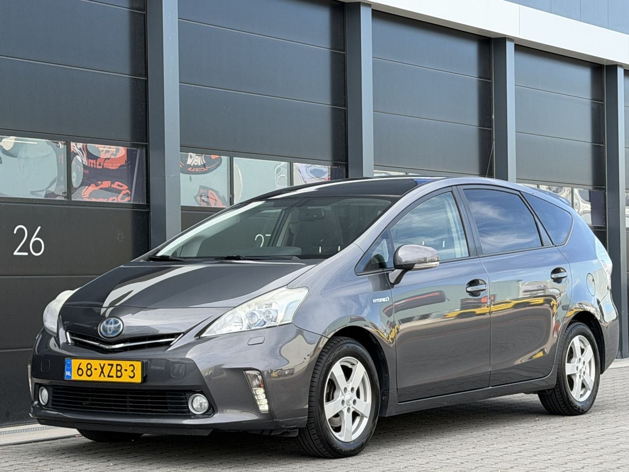 Toyota Prius - Plus 1.8 Dynamic Pano Head-Up 7-PERS - AutoWereld.nl
