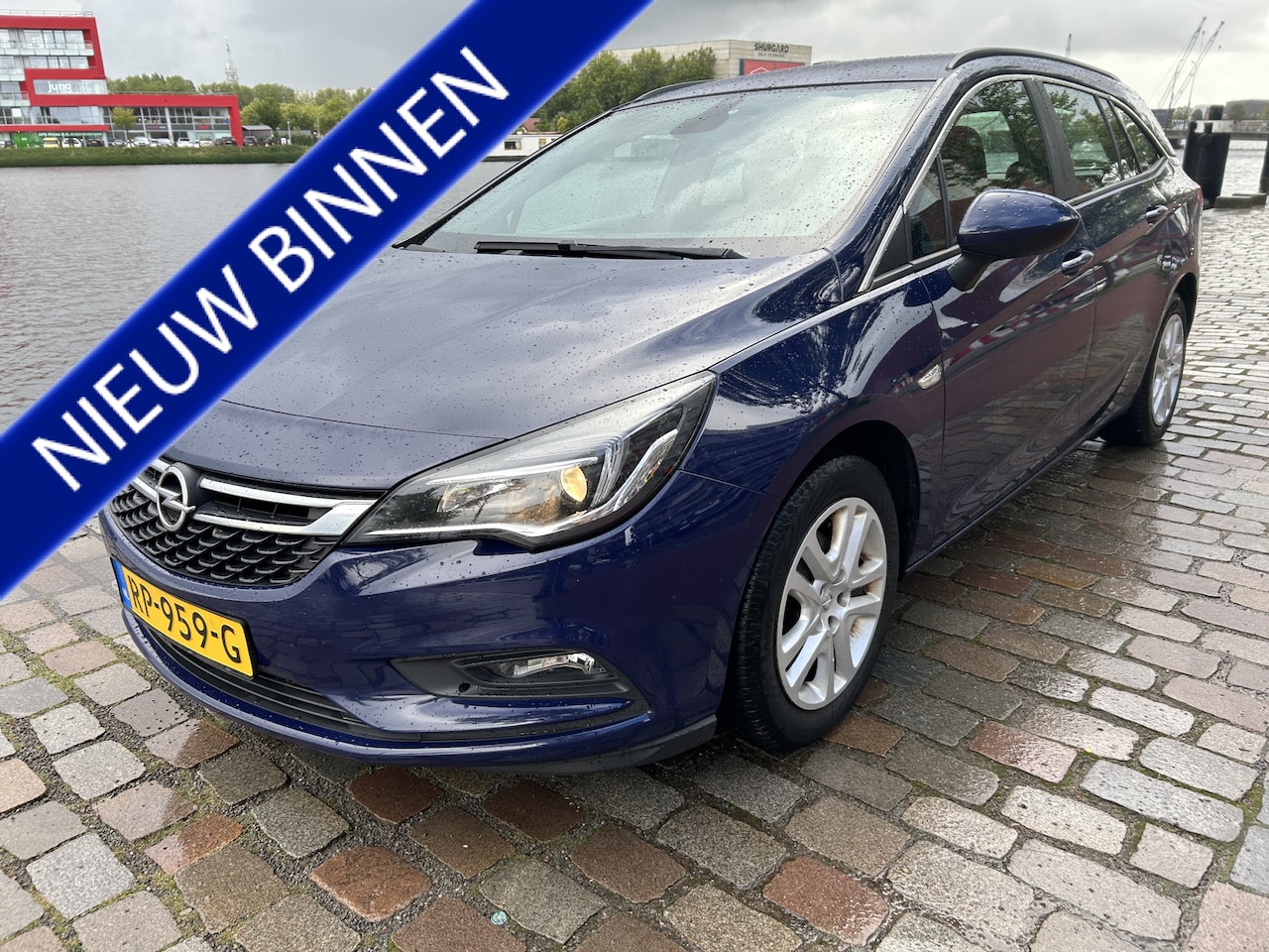 Opel Astra Sports Tourer - 1.4 Business+ airco navigatie keurige auto - AutoWereld.nl
