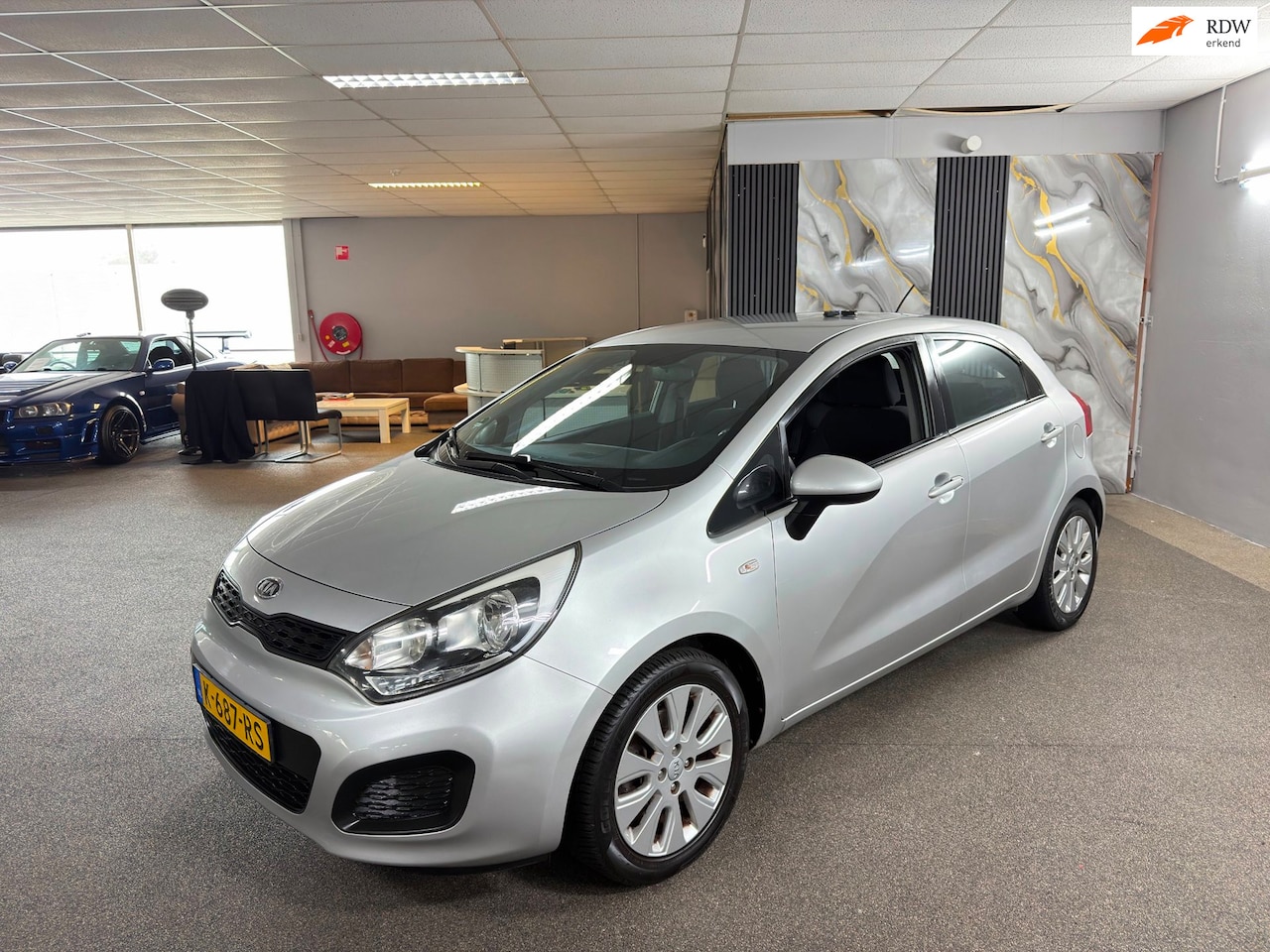 Kia Rio - 1.4 CVVT Comfort Pack Apk Nieuw,Cruise,Clima,N.A.P,Trekhaak,2sleutels+boekjes,Topstaat!! - AutoWereld.nl