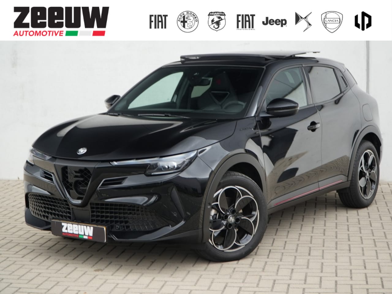 Alfa Romeo Junior - 1.2 Turbo 145 PK Ibrida Speciale | Schuifdak | Sabelt | Techno | 18" - AutoWereld.nl