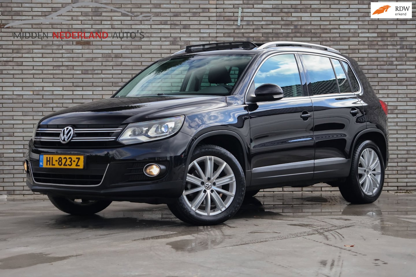 Volkswagen Tiguan - 2.0 TSI Track&Field 4Motion * TREKHAAK * PANORAMA * KEYLESS * - AutoWereld.nl