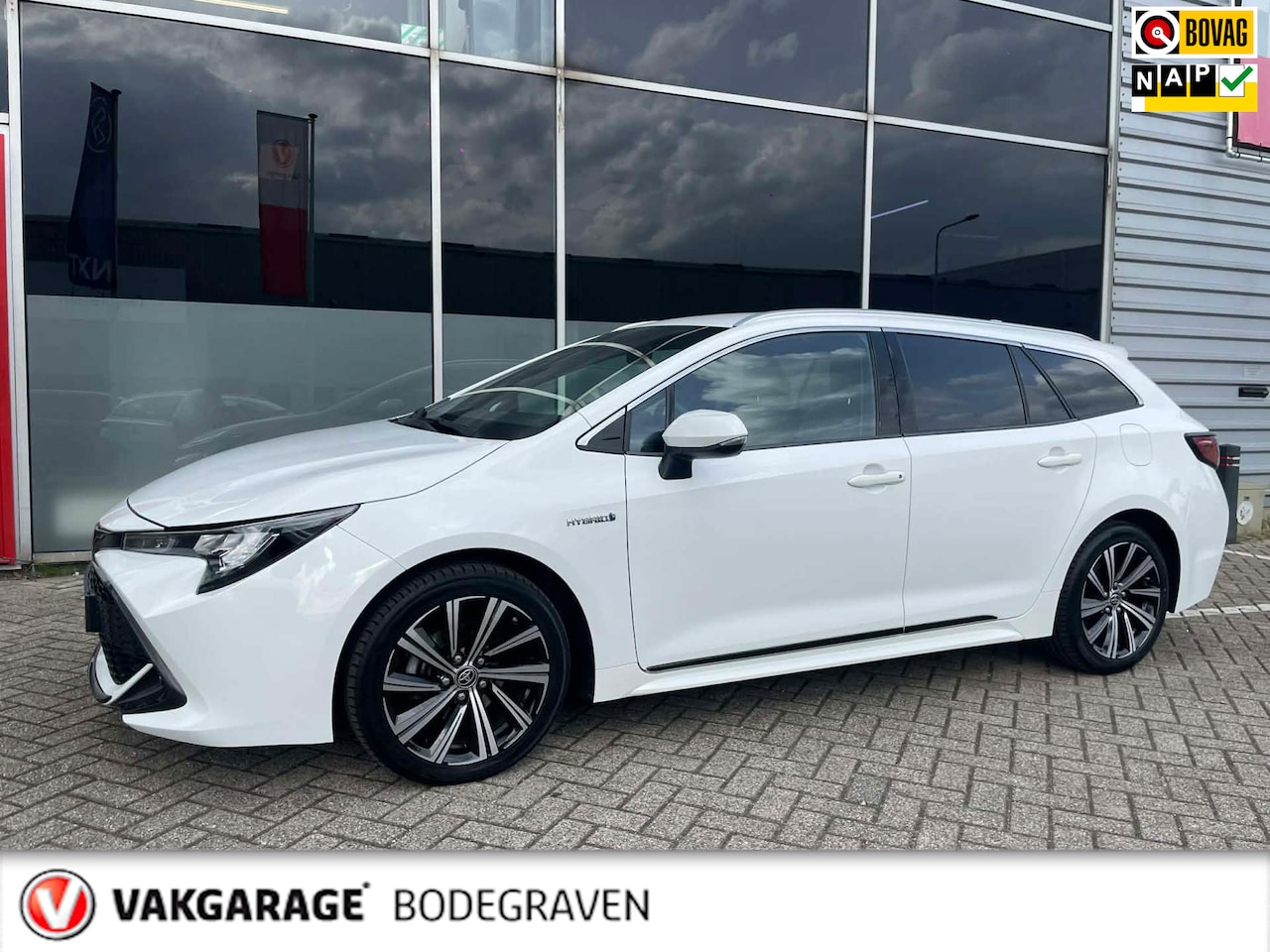 Toyota Corolla Touring Sports - 1.8 Hybrid TeamNL / trekhaak / camera - AutoWereld.nl