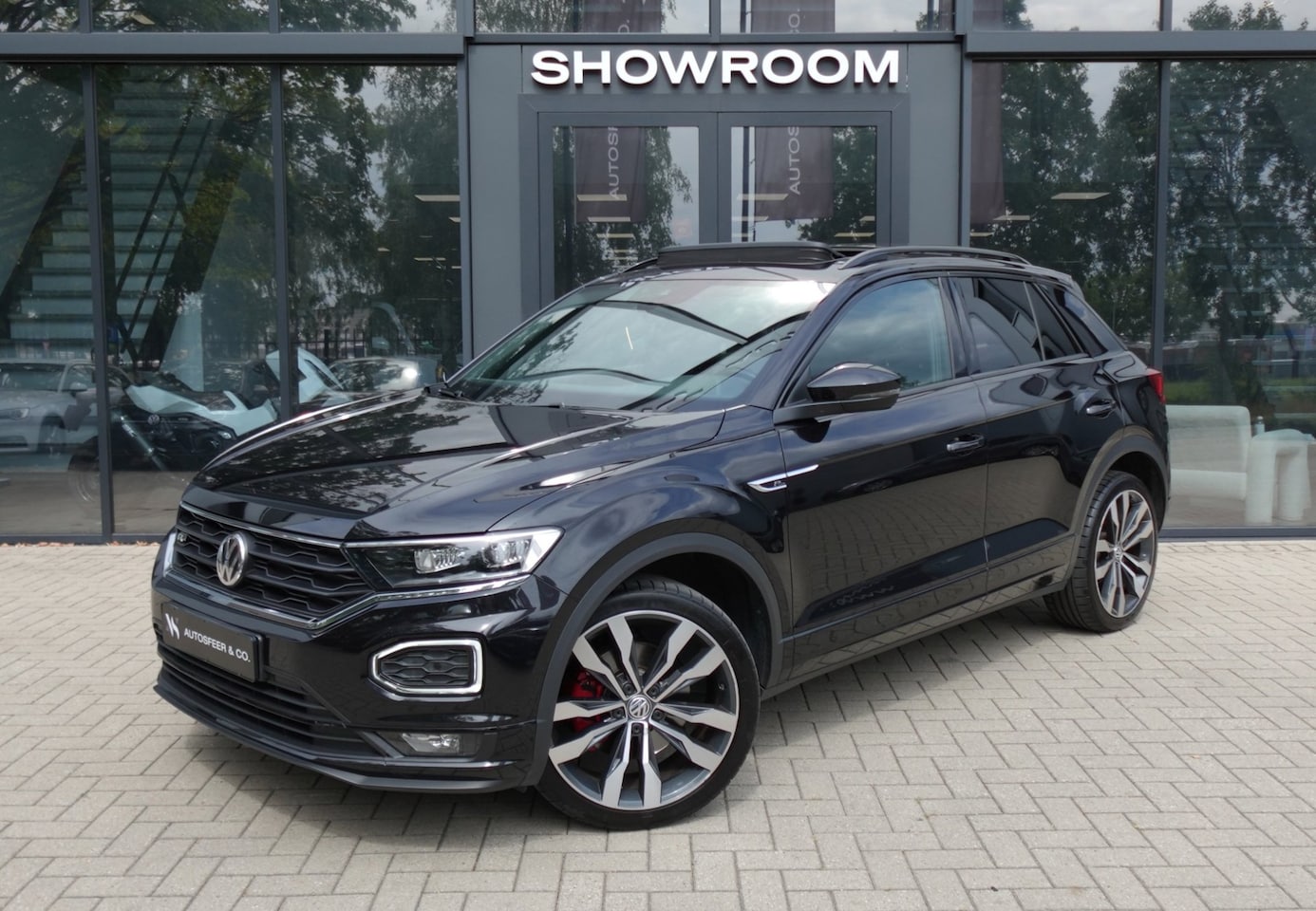 Volkswagen T-Roc - 1.5 TSI Sport Business R PANO CAM ACC - AutoWereld.nl