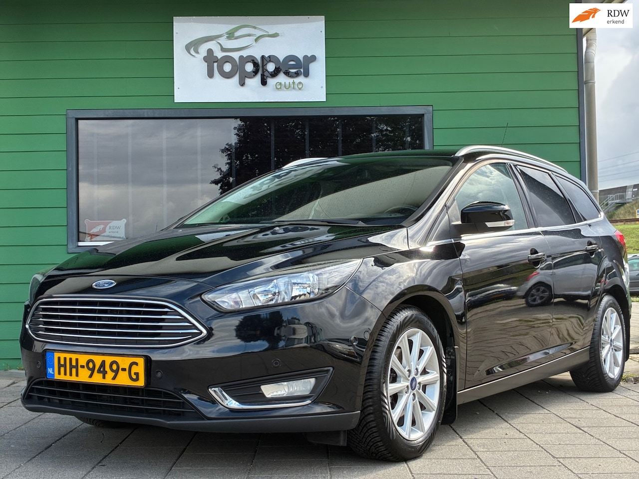 Ford Focus Wagon - 1.0 First Edition|Navigatie|CruiseControl|Trekhaak|Climatronic|Nieuwe APK|PDC| - AutoWereld.nl