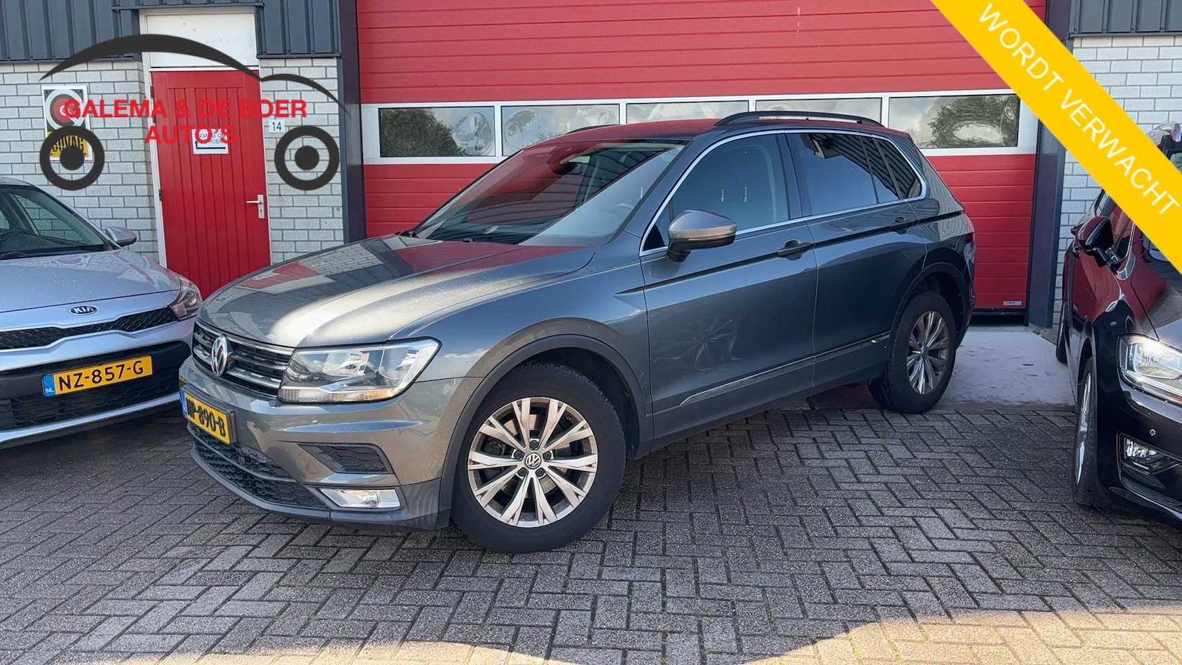 Volkswagen Tiguan - 1.4 TSI Comfortline 1STE EIG / NAVI / CLIMA / PDC / BLUETOOTH / CRUISE / NL-AUTO - AutoWereld.nl