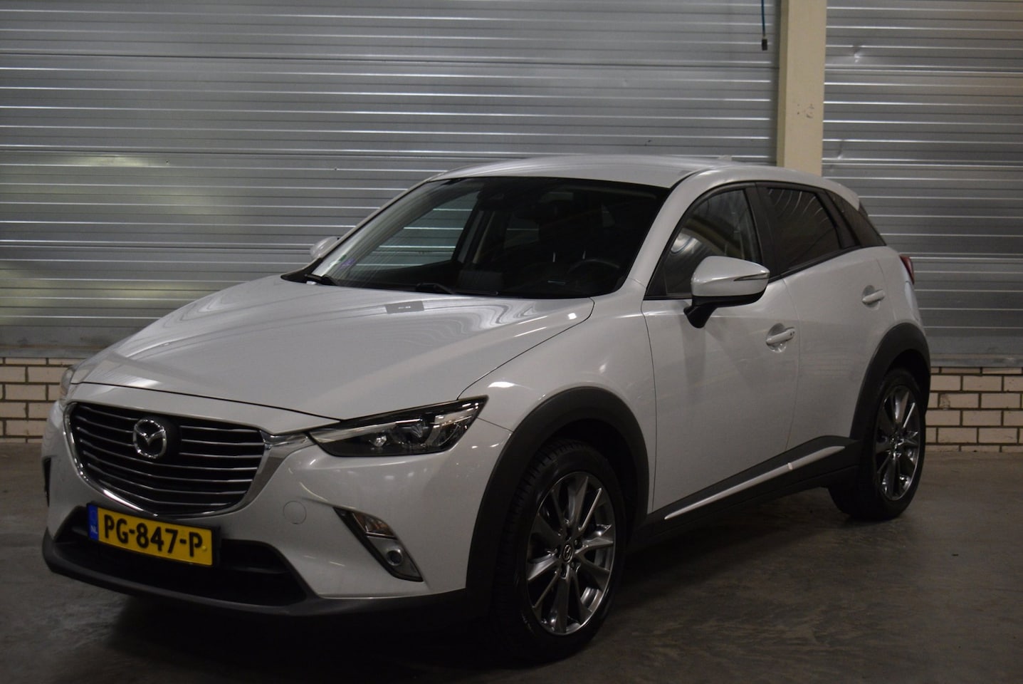 Mazda CX-3 - 2.0 SkyActiv-G 120 GT-Luxury|Parelmoer Wit|Automaat|Leder|Camera|Navigatie|Trekhaak|Stoelv - AutoWereld.nl