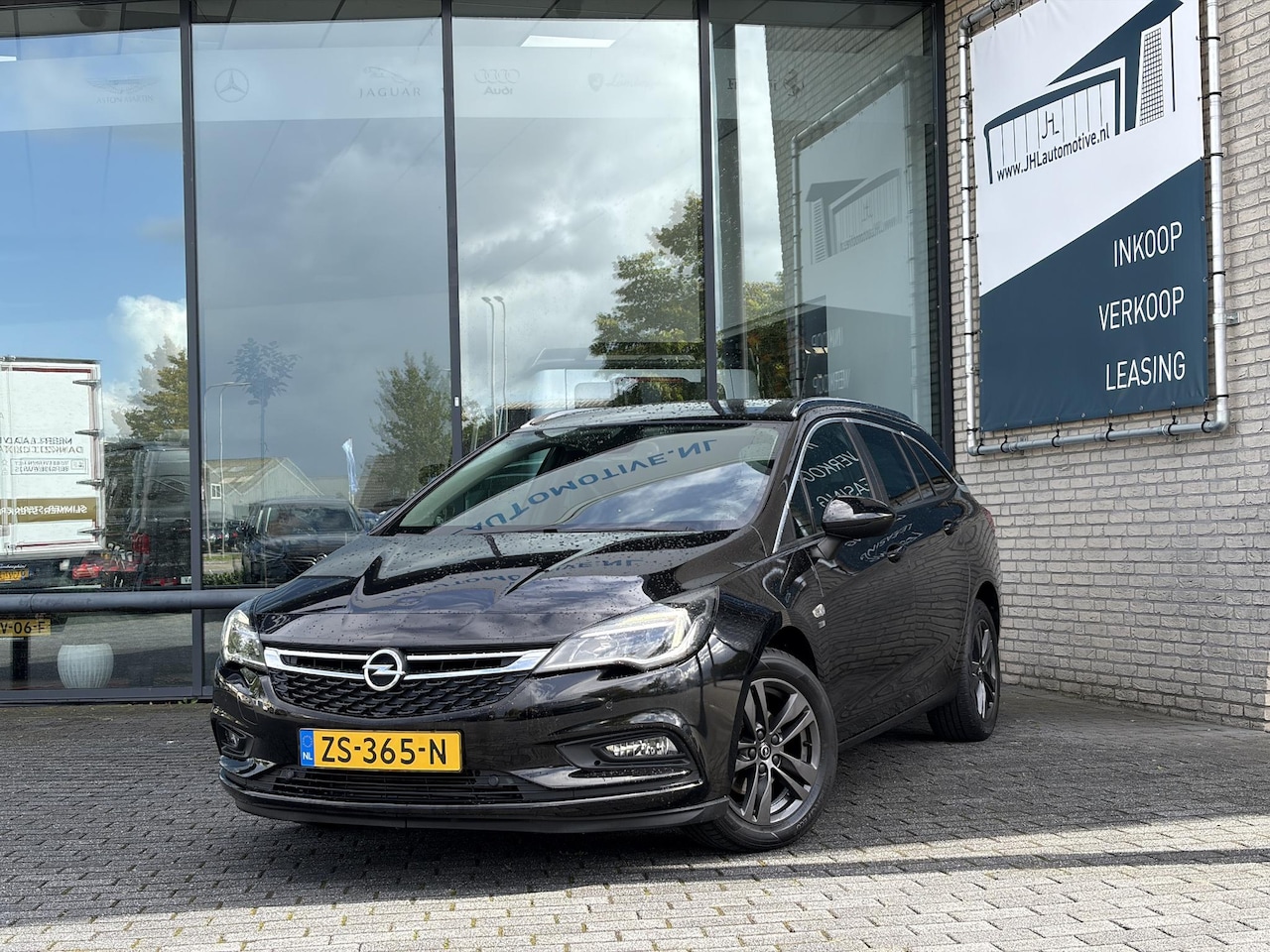 Opel Astra Sports Tourer - 1.0 Turbo 120 Jaar Edition*ECC*CRUISE*NAVI*PDC* - AutoWereld.nl