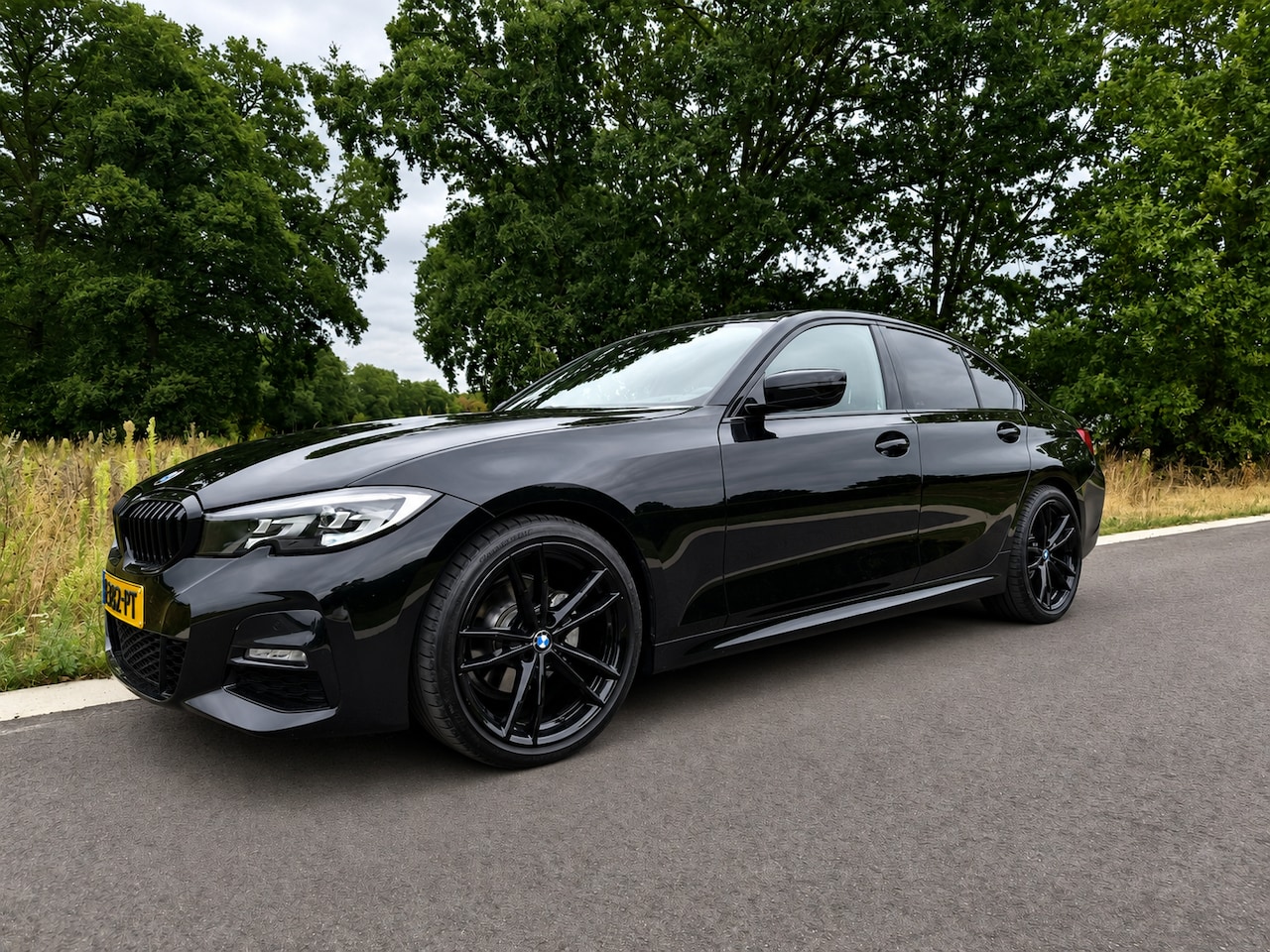 BMW 3-serie - 320i High Executive Edition - AutoWereld.nl