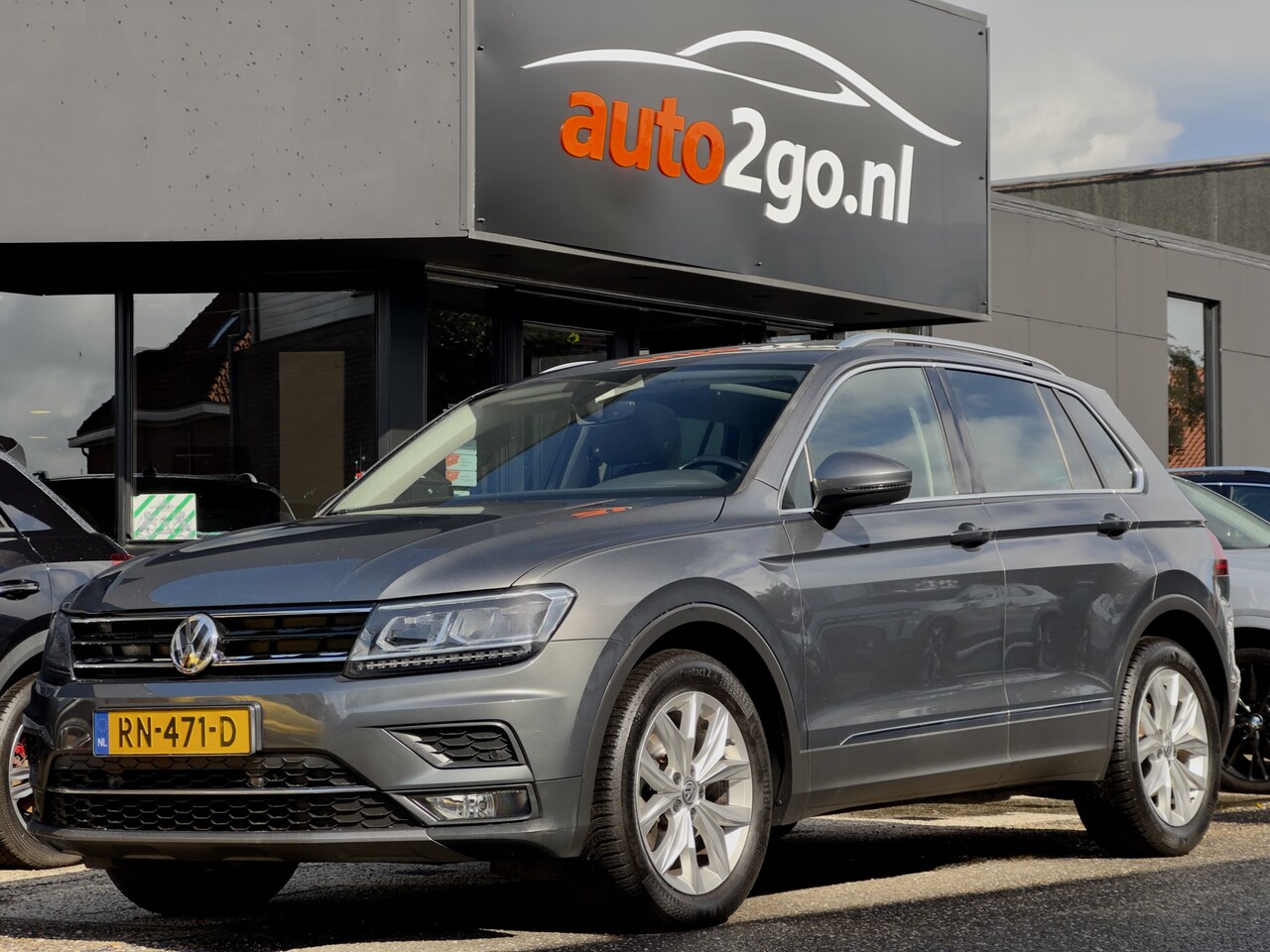 Volkswagen Tiguan - 1.4 TSI AUT6 HIGHLINE PANODAK NAVI DIGI-DASH AIRCO LMV-18" LED PDC - AutoWereld.nl