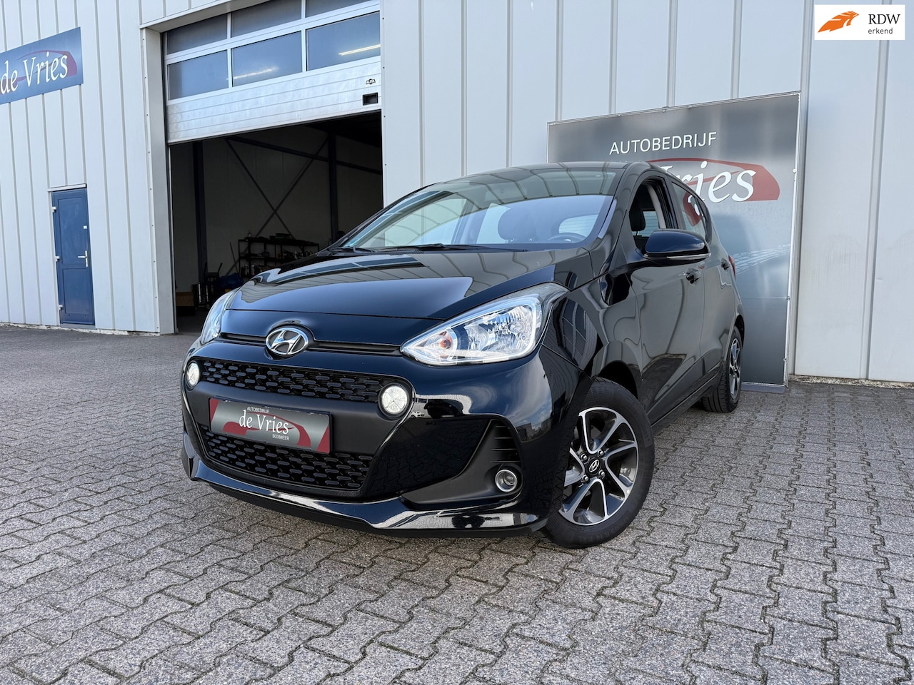 Hyundai i10 - 1.2 i-Premium / Airco / Navi / Cruise control / Stuurverw. / Stoelverw. / - AutoWereld.nl
