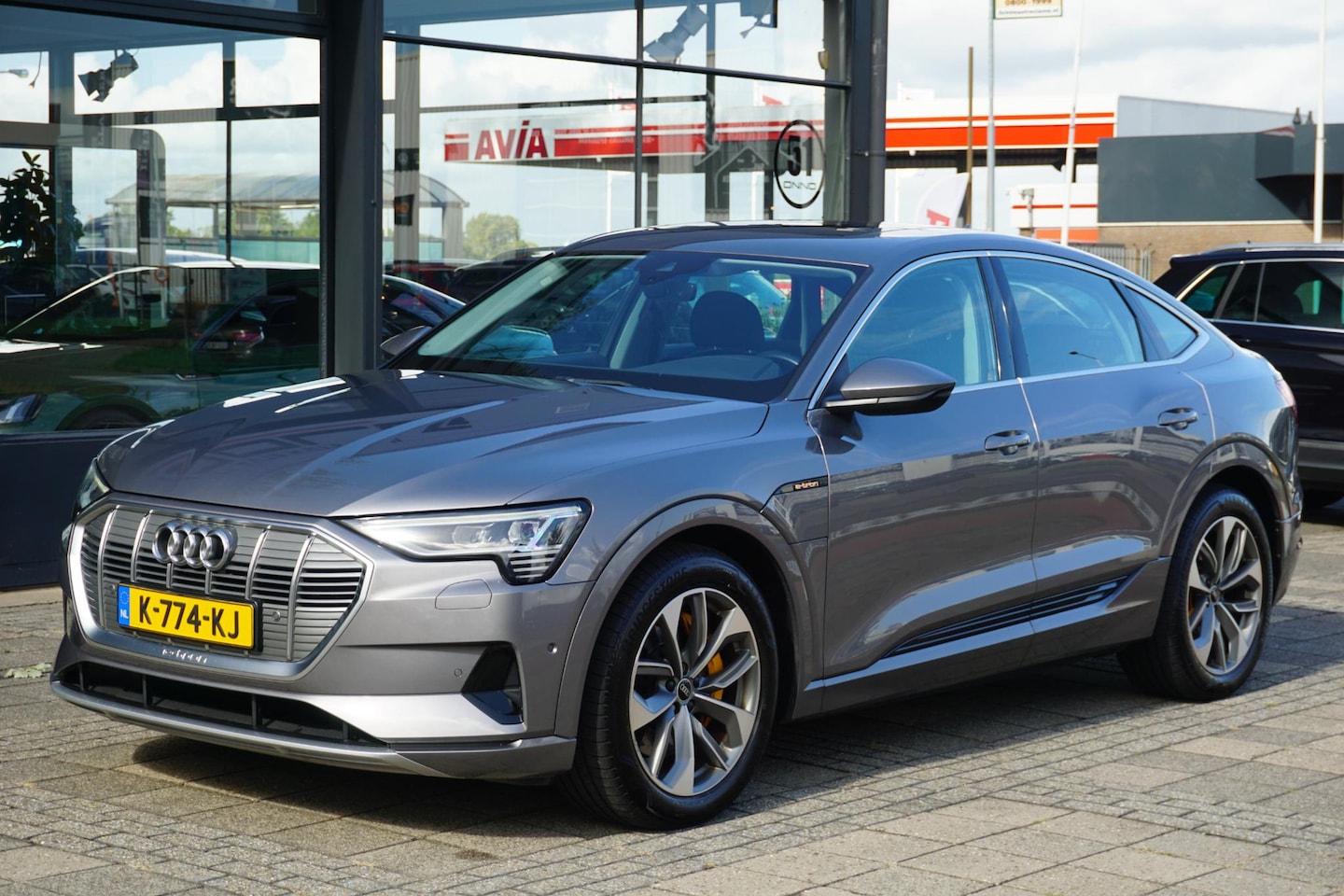 Audi e-tron Sportback - 55 quattro Business edition Plus 95 kWh | trekhaak | PANO | 91% soh | luchtvering - AutoWereld.nl