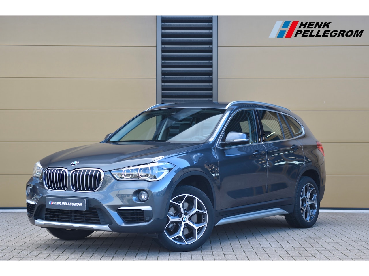 BMW X1 - sDrive20i Orange Edition II * X-Line * Head-Up * Sportstoel * LED * Lichtpakket * Achterui - AutoWereld.nl
