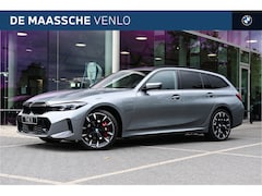 BMW 3-serie Touring - 330e M Sport Automaat / Panoramadak / Trekhaak / Harman Kardon / Adaptieve LED / Parking A