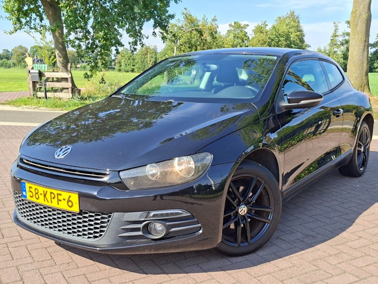 Volkswagen Scirocco - 1.4TSi 122pk Airco Cruise-control - AutoWereld.nl