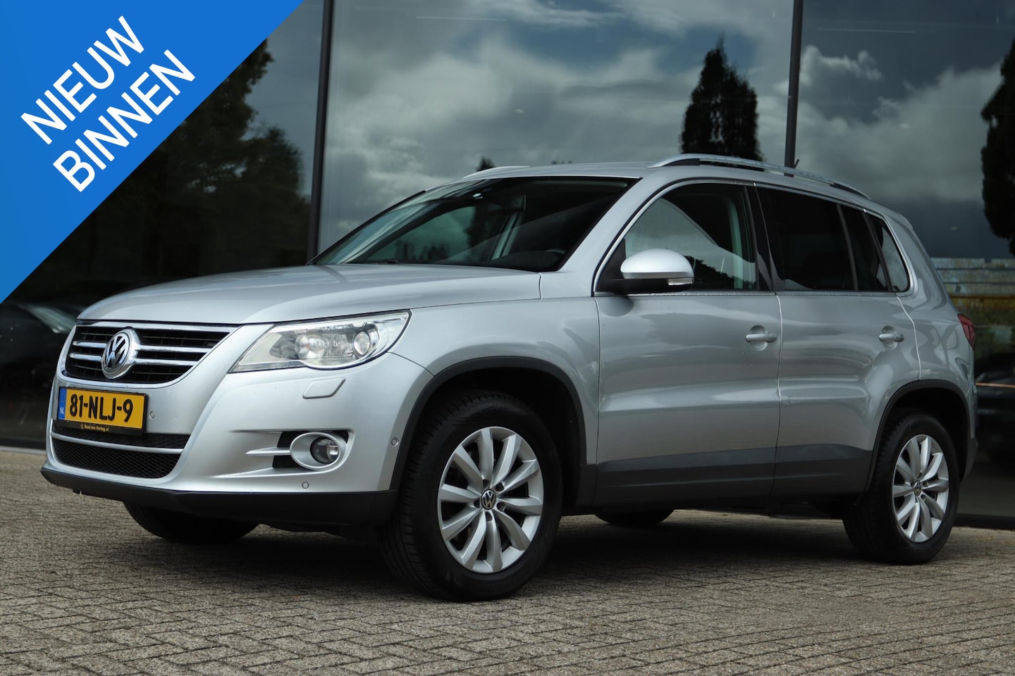 Volkswagen Tiguan - 2.0 TSI SPORT&STYLE 4MOTION | XENON | TREKHAAK | CARPLAY | CAMERA | - AutoWereld.nl