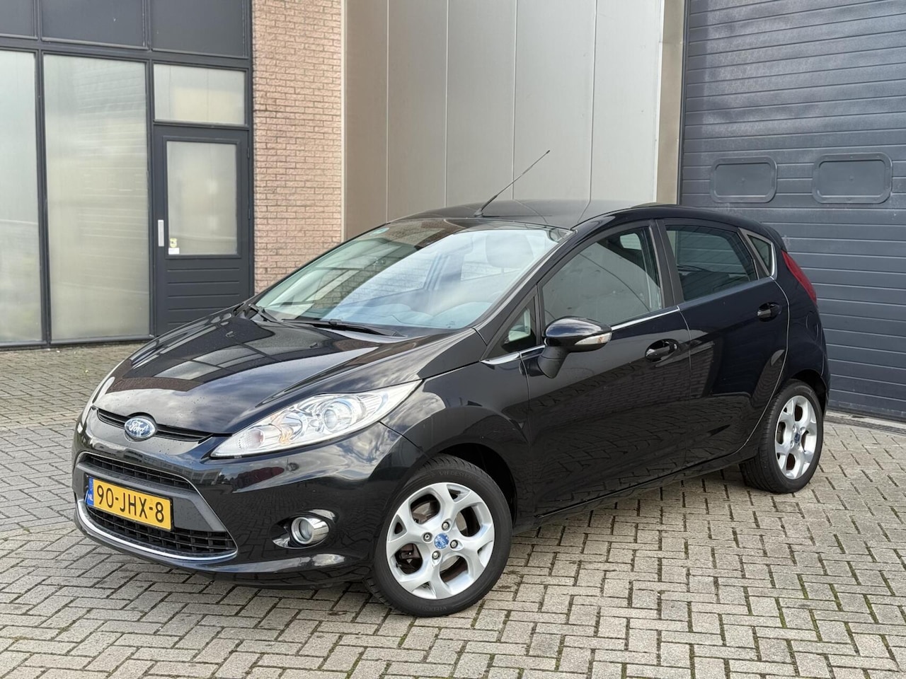 Ford Fiesta - 1.4 Titanium 5-DRS Airco/Cruise/Aux/Sensoren - AutoWereld.nl