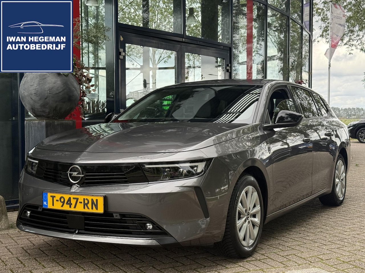 Opel Astra Sports Tourer - 1.2 Business Edition 130PK | Afn. Trekhaak |ECC | PDC voor achter + Camera | Navigatie | L - AutoWereld.nl