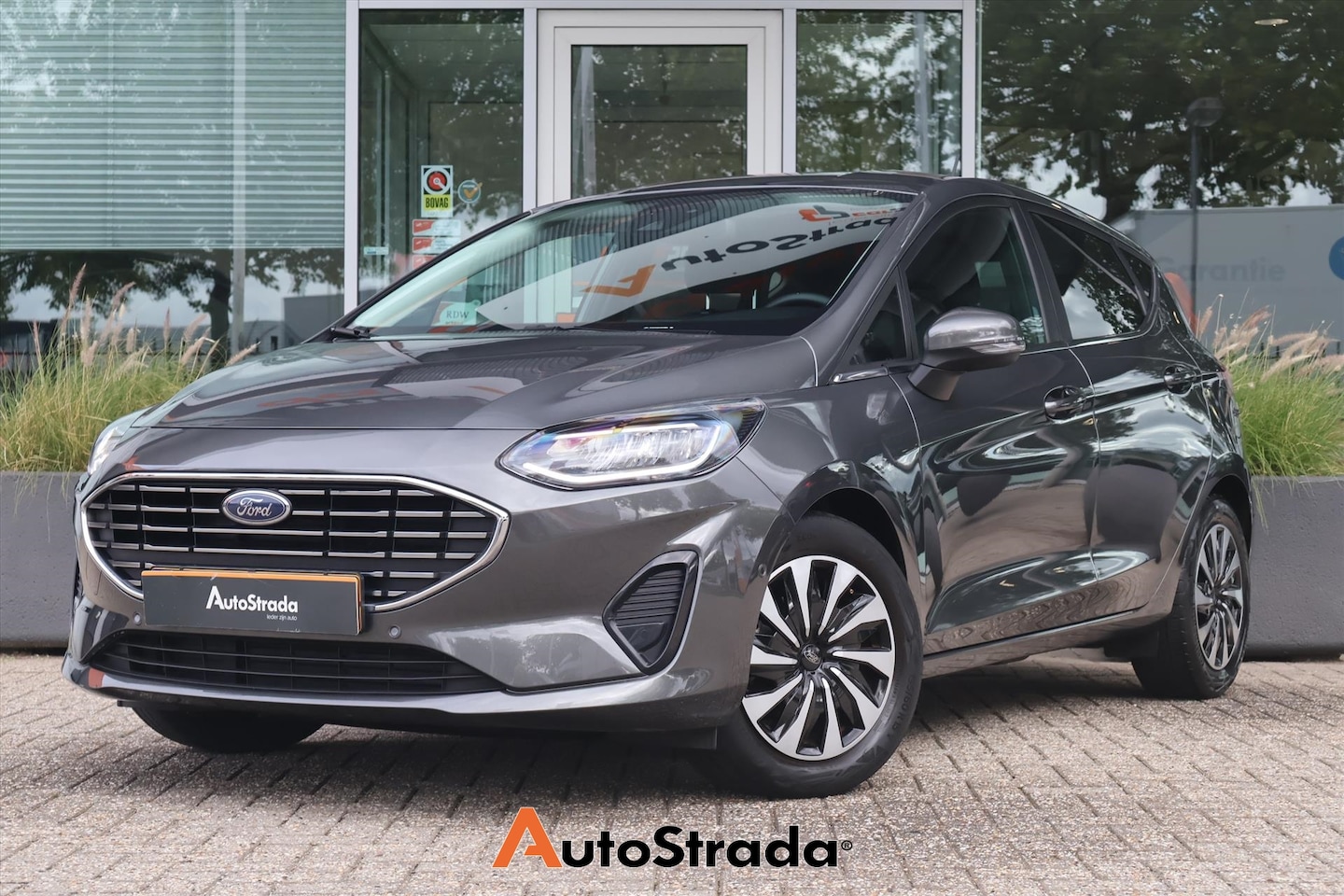 Ford Fiesta - 1.0 EcoBoost Titanium 125pk MHEV I Camera I Trekhaak I Navi I Keyless I Cruise I 1e eigena - AutoWereld.nl