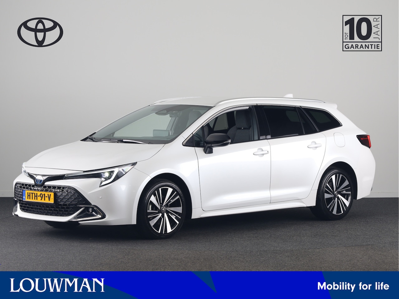 Toyota Corolla Touring Sports - Hybrid 180 Business Plus | Parkeersensoren V+A | Half lederen bekleding | Parelmoer lak | - AutoWereld.nl