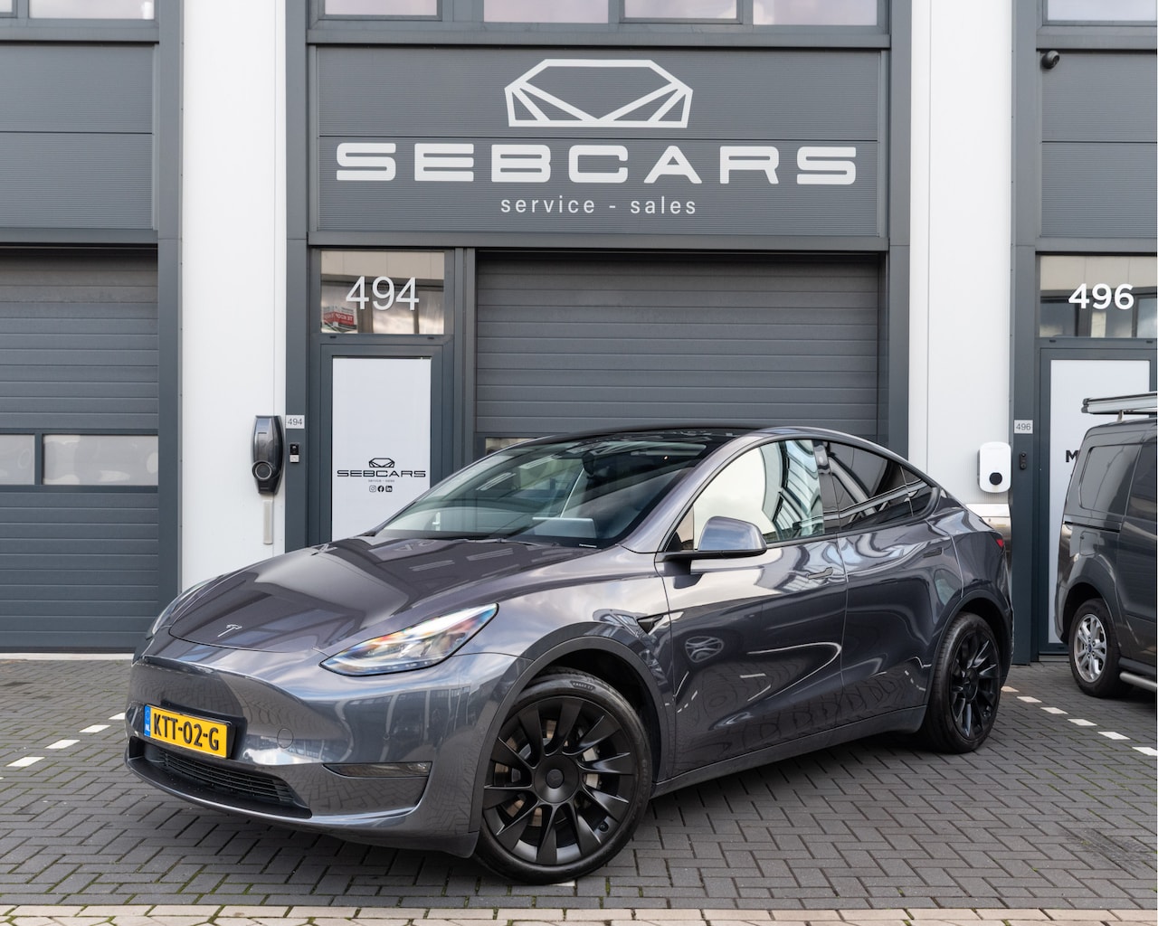 Tesla Model Y - Long Range Dual Motor AWD 75 kWh 20INCH, PANODAK, BTW AUTO, LAGE KMSTAND - AutoWereld.nl
