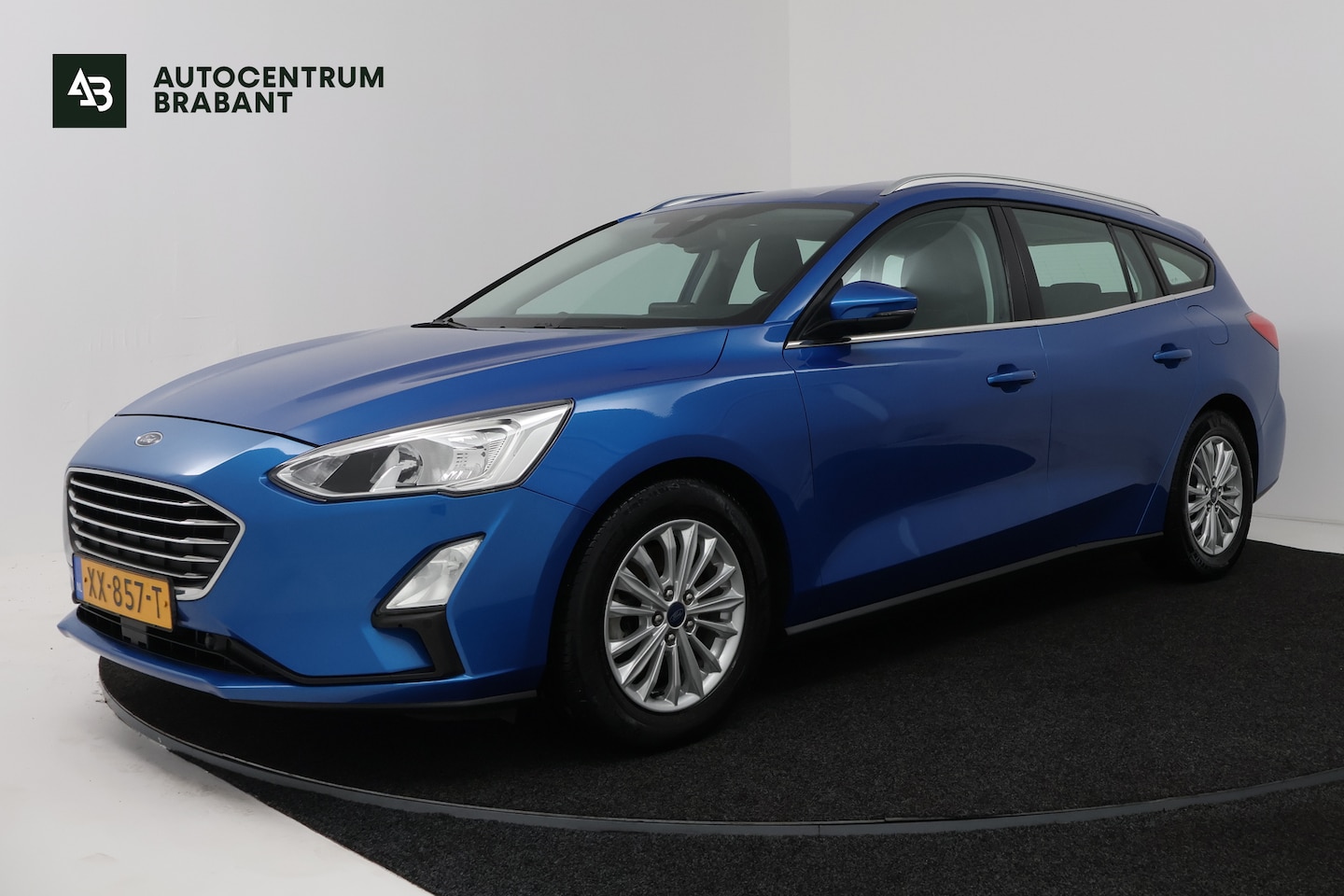 Ford Focus Wagon - 1.5 EcoBoost Titanium Business (STOEL/STUUR VERWARMING, TREKHAAK, NAVIGATIE, PARKEERSENSOR - AutoWereld.nl