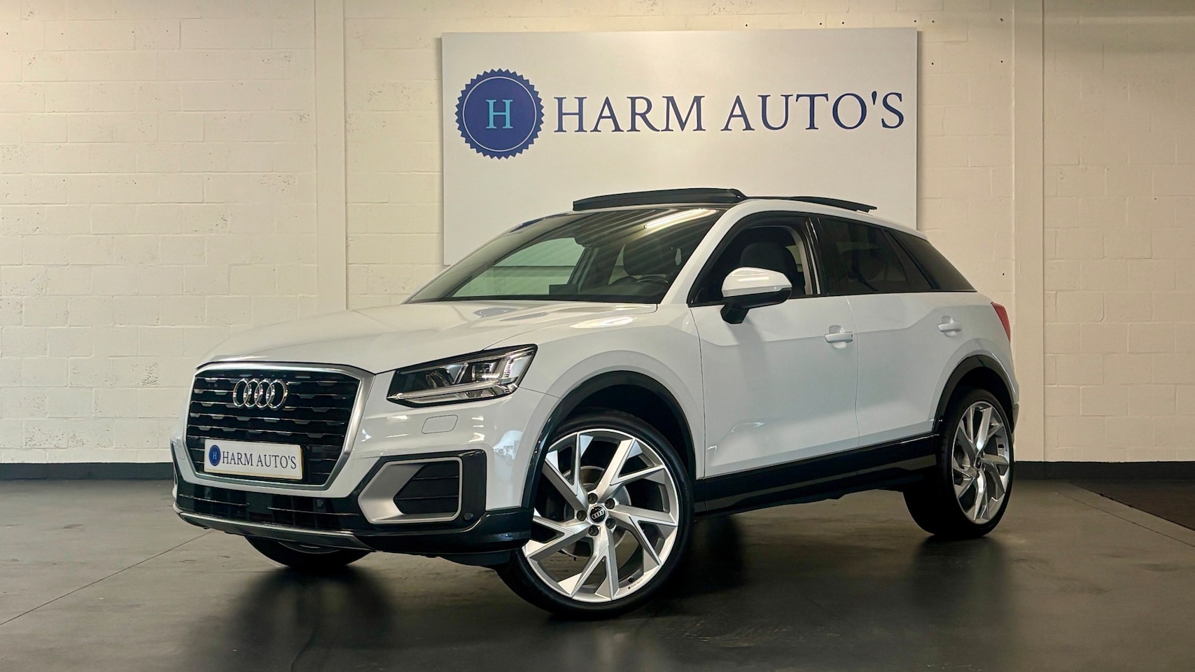 Audi Q2 - 1.4 TFSI CoD Sport 150pk DSG Pano / LED / Navi / Trekhaak / PDC - AutoWereld.nl