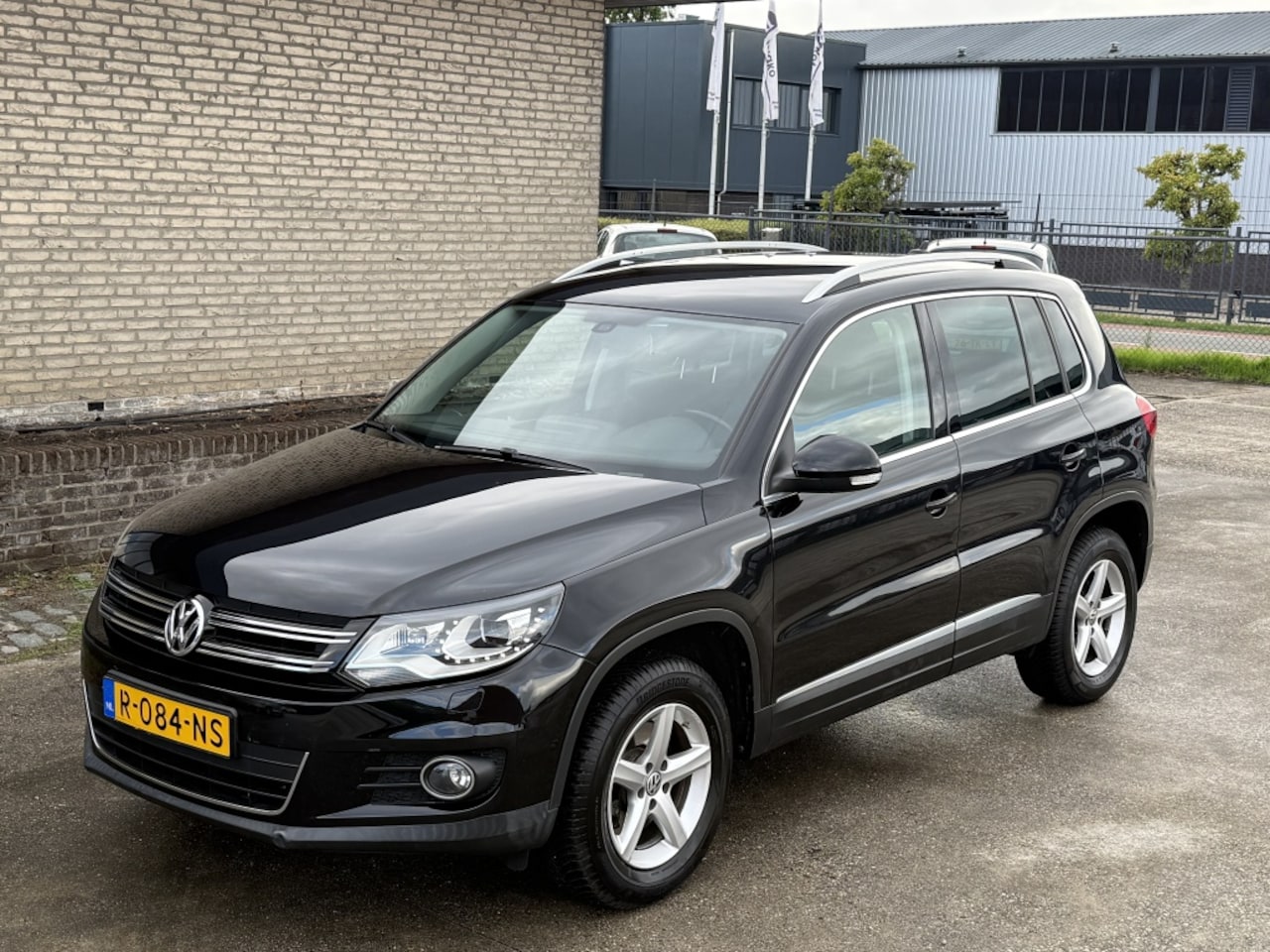 Volkswagen Tiguan - 1.4 TSI Sport&Style - AutoWereld.nl