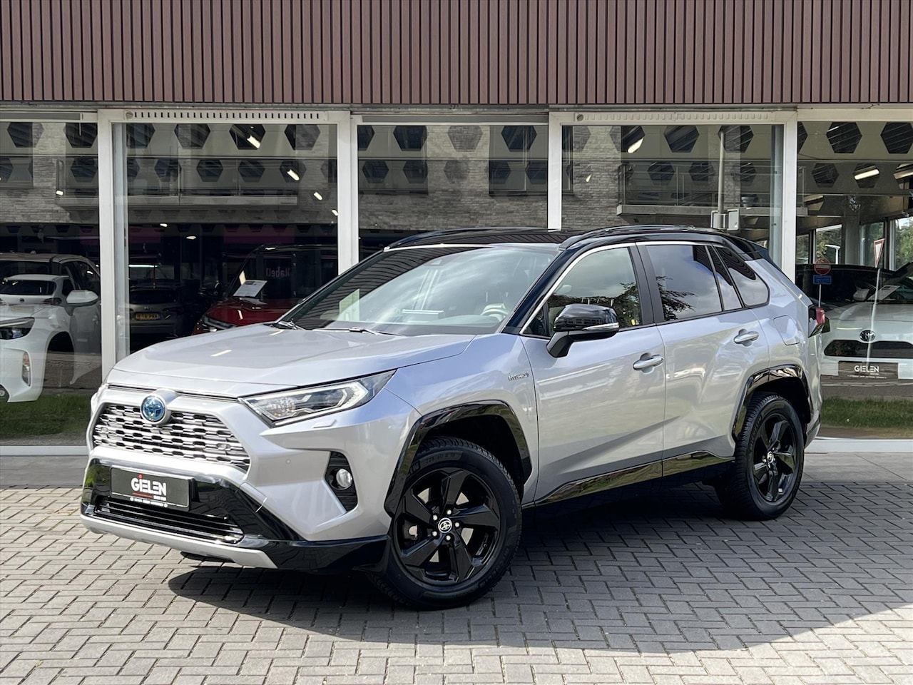 Toyota RAV4 - 2.5 Hybrid Bi-Tone | Trekhaak, 18 inch, Parkeersensoren, Stoel + Stuurverwarming, LED, App - AutoWereld.nl