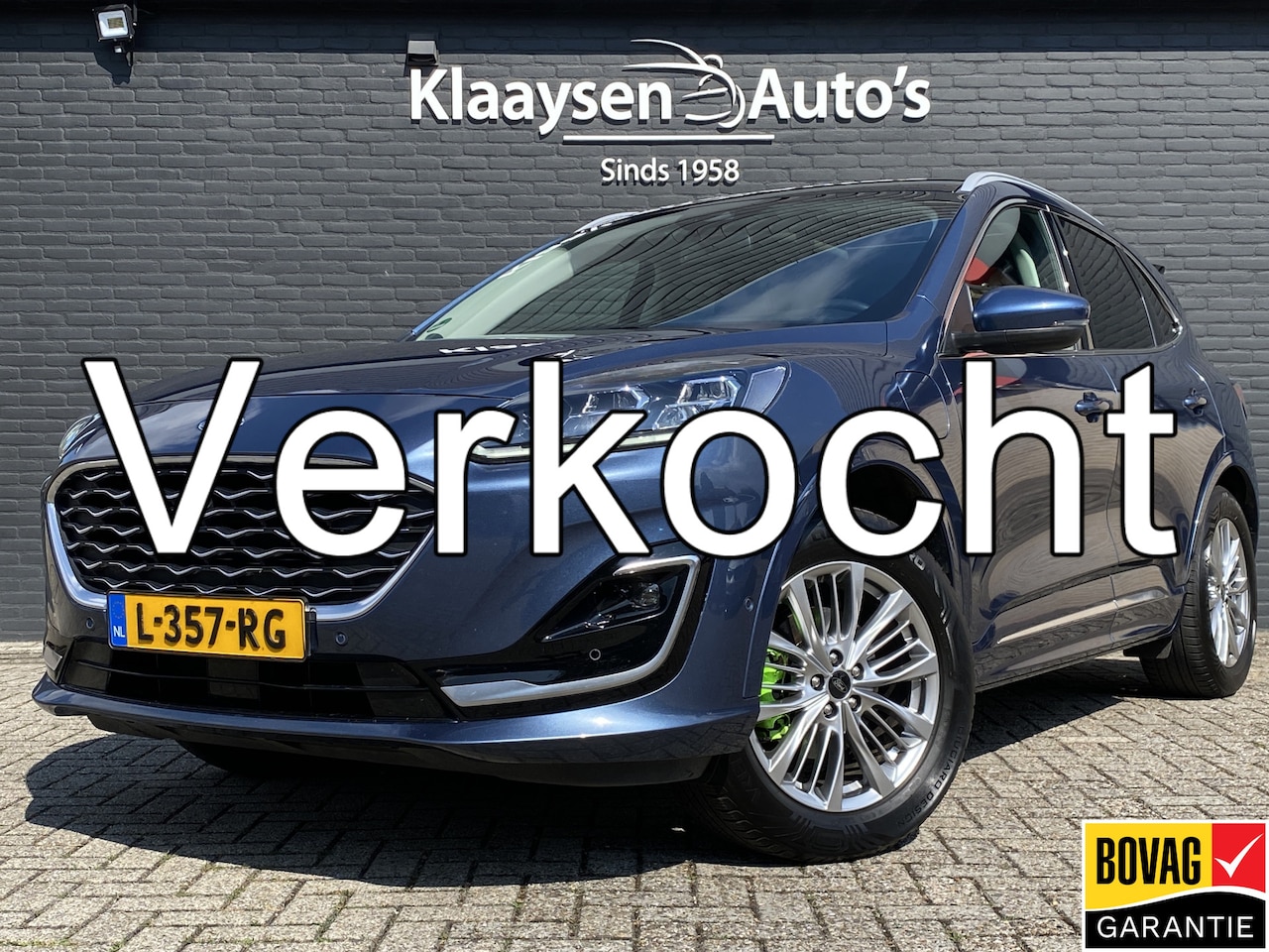 Ford Kuga - 2.5 PHEV Vignale 225 pk | dealer onderh. | panoramadak | leder interieur | elektr. v. stoe - AutoWereld.nl
