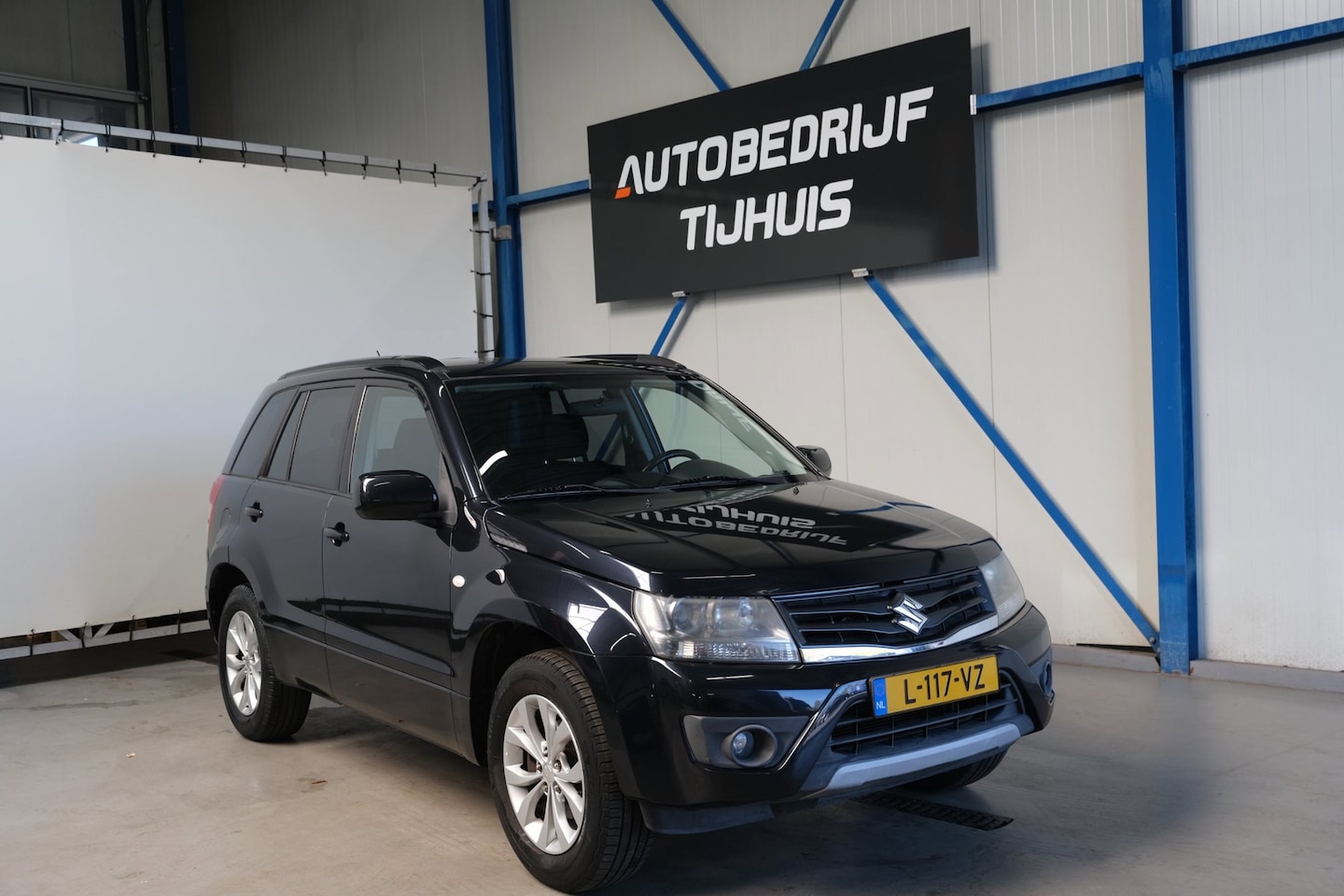 Suzuki Grand Vitara - 2.4 Exclusive RWD Automaat - Airco, PDC. - AutoWereld.nl