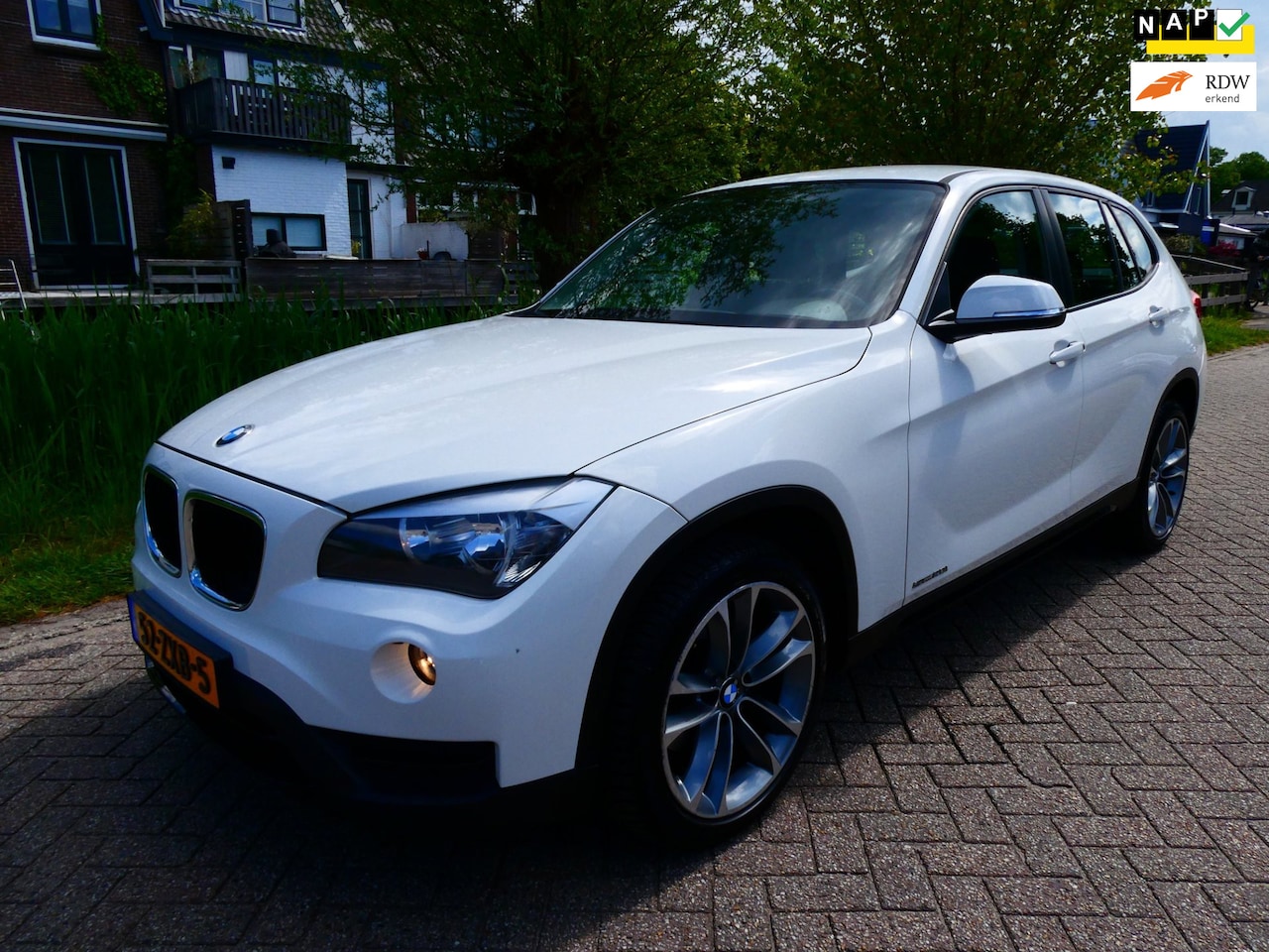 BMW X1 - S-Drive 2.0i 184pk 155.000km Airco Cruise Trekhaak 1800kg. Geen import - AutoWereld.nl