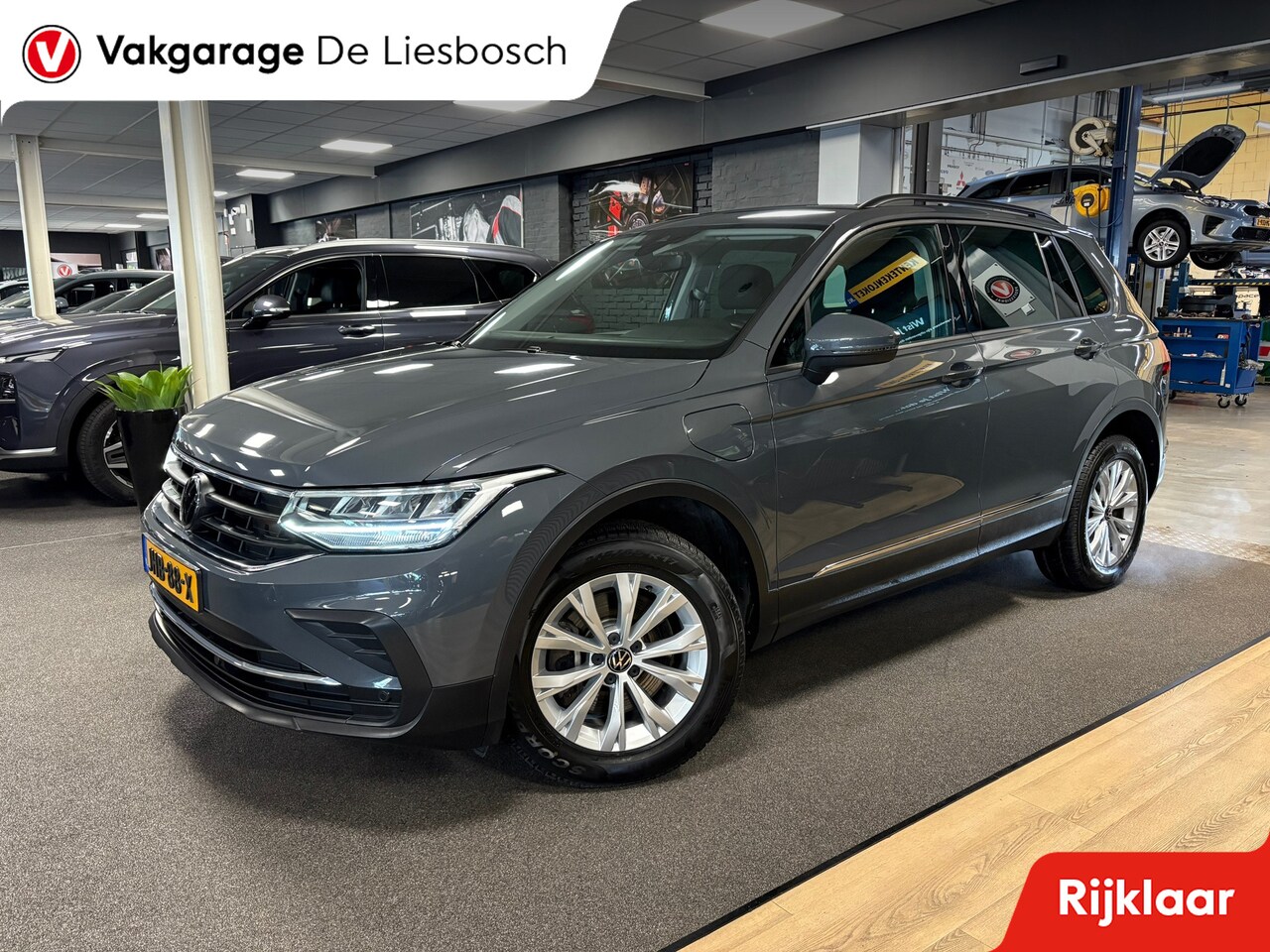 Volkswagen Tiguan - 1.4 TSI eHybrid comfort Business / navi / camera / carplay / boeken - AutoWereld.nl