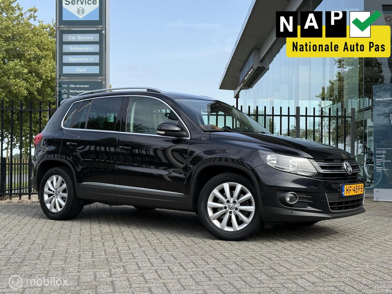 Volkswagen Tiguan - 1.4 TSI Sport&Style | Navi | Cruise | Park - AutoWereld.nl