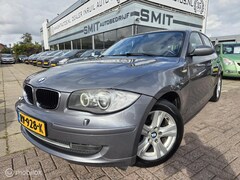BMW 1-serie - 118i High Executive Aut/Ecc/CC/Nav/PDC