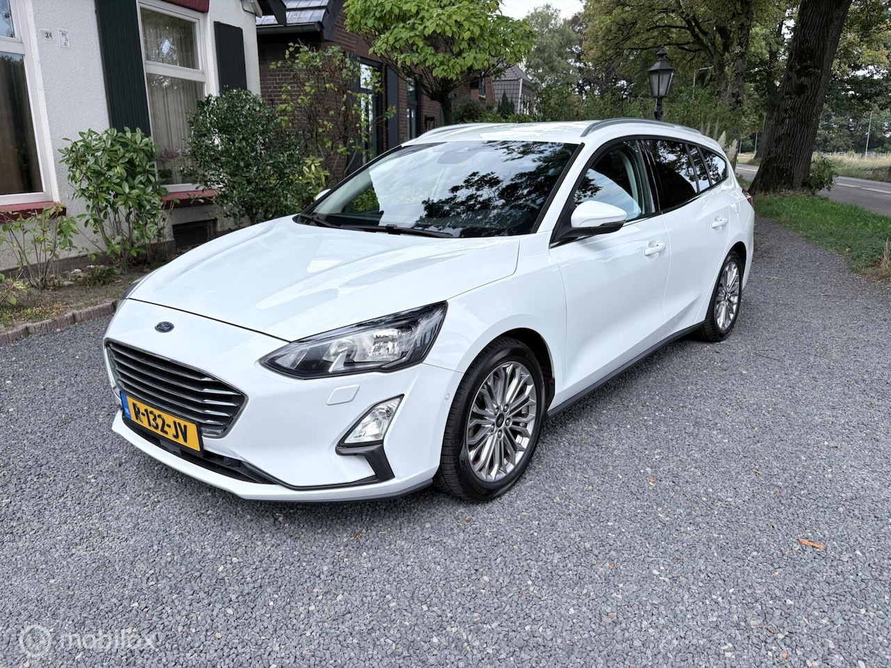 Ford Focus Wagon - 1.0 Titanium Business | NAVI | STOELVERW. | - AutoWereld.nl