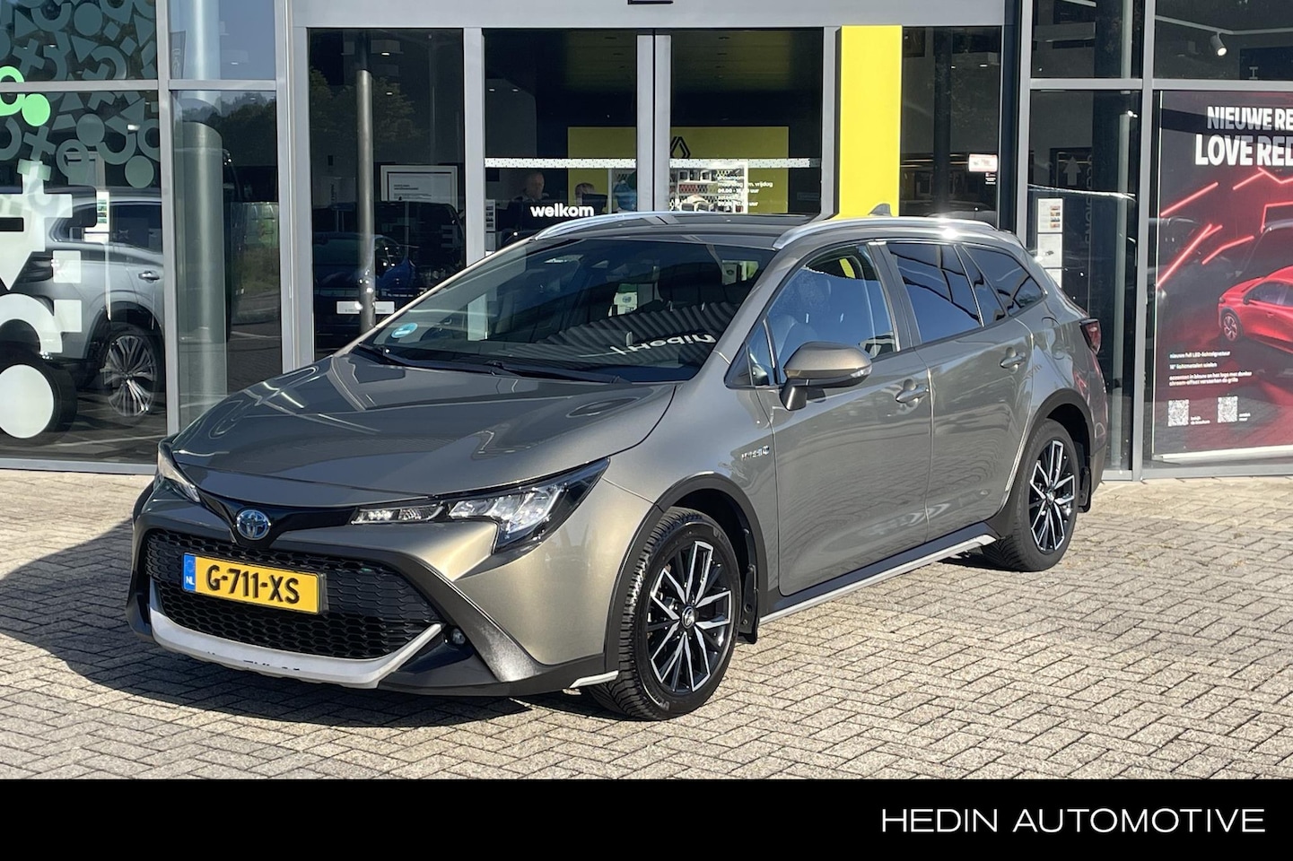 Toyota Corolla Touring Sports - 1.8 Hybrid Trek NAV | Climate Control | Lane Assist | adapt. Cruise Control | Trekhaak - AutoWereld.nl