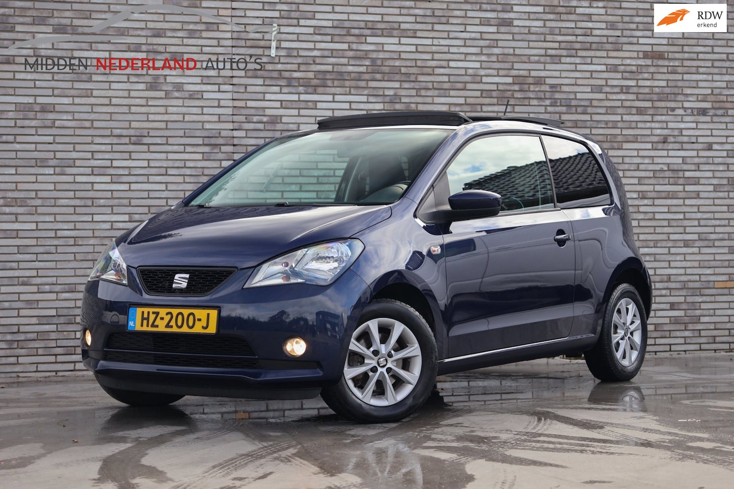 SEAT Mii - 1.0 Style * PANORAMA DAK * AIRCO * NAP PAS * NAVIGATIE * APK 06-2027 * - AutoWereld.nl