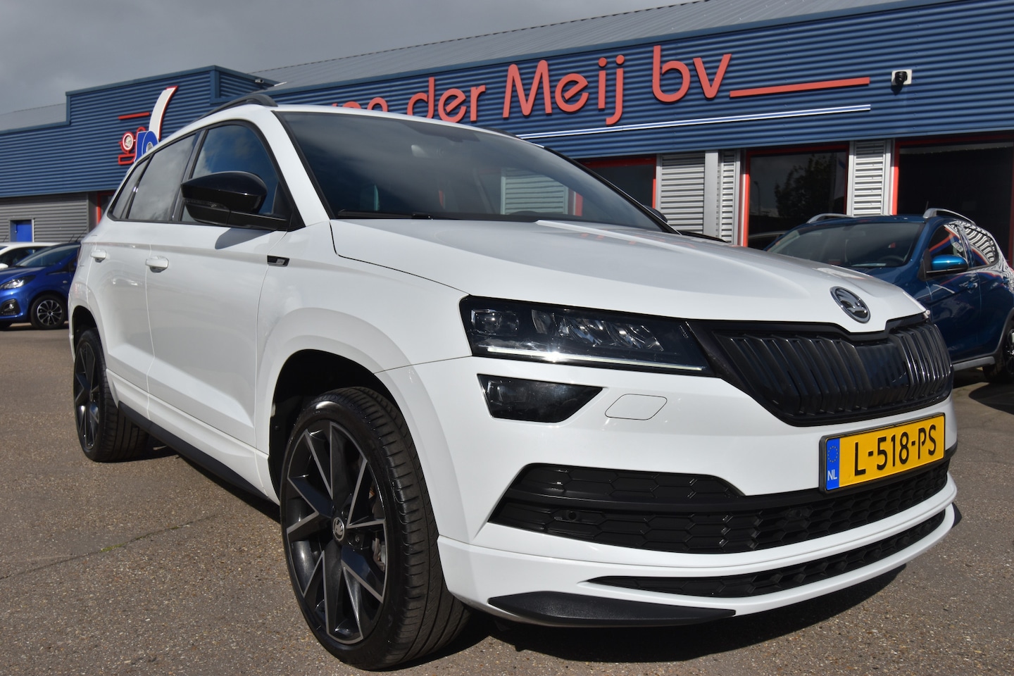 Skoda Karoq - 1.5 TSI ACT Sportline Business 1.5 TSI ACT Sportline Business , VIRTUAL COCKPIT , ST+STUUR VERW , NAVI , CLIMATR , CR CON - AutoWereld.nl