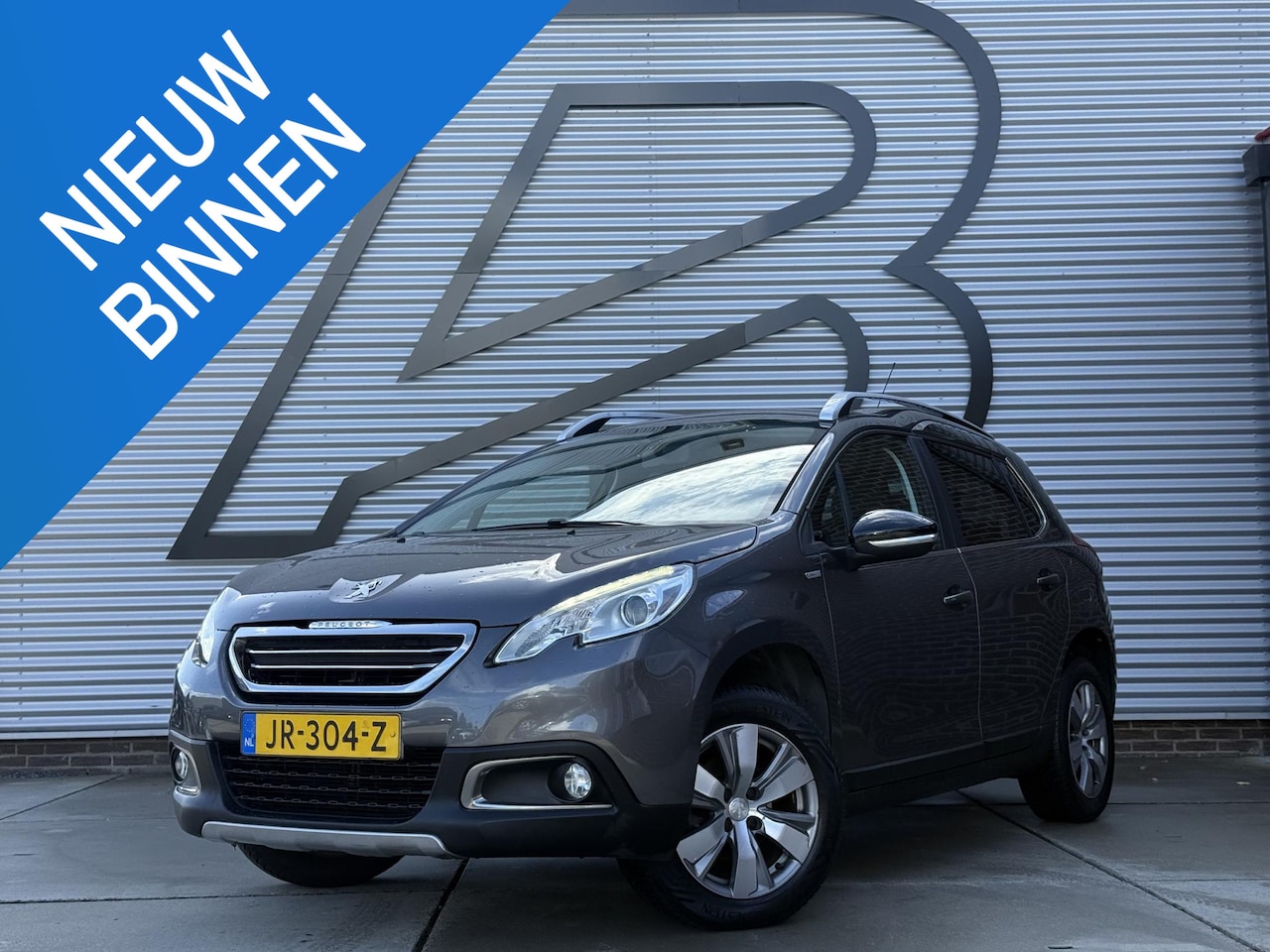 Peugeot 2008 - 1.2 PureTech Urban Cross Navi|Airco|Trekhaak|Cruise|PDC|Elek ramen|N.A.P|Nieuwe APK bij af - AutoWereld.nl
