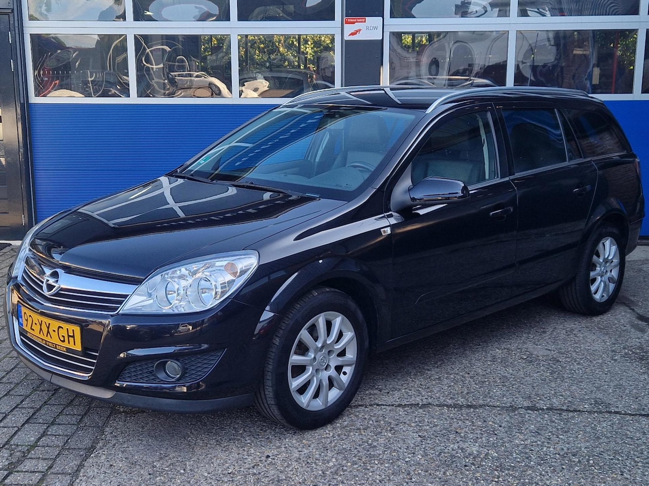 Opel Astra Wagon - 1.6 Cosmo / Trekhaak / Stoelverwarming / Leder / Airco / Cruise control / 16 inch / Boekje - AutoWereld.nl