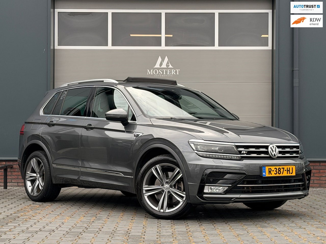 Volkswagen Tiguan - 2.0 TSI/220pk 4Motion Highline Business R|2x R-line|Dynaudio|Pano|Adaptive cruise|Stoelver - AutoWereld.nl