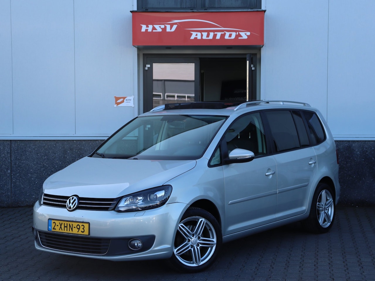 Volkswagen Touran - 1.2 TSI Highline BlueMotion 7-pers navi LEER org NL - AutoWereld.nl