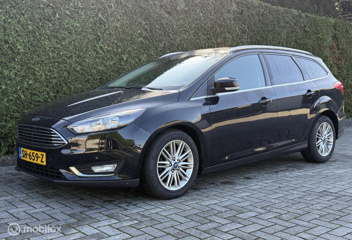 Ford Focus Wagon - 1.0 Titanium Cruise Clima Stoelvw - AutoWereld.nl
