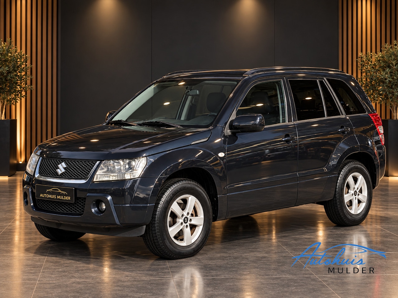 Suzuki Grand Vitara - 2.0-16V Shogun | 4x4 | Trekhaak | Airco | N.A.P - AutoWereld.nl