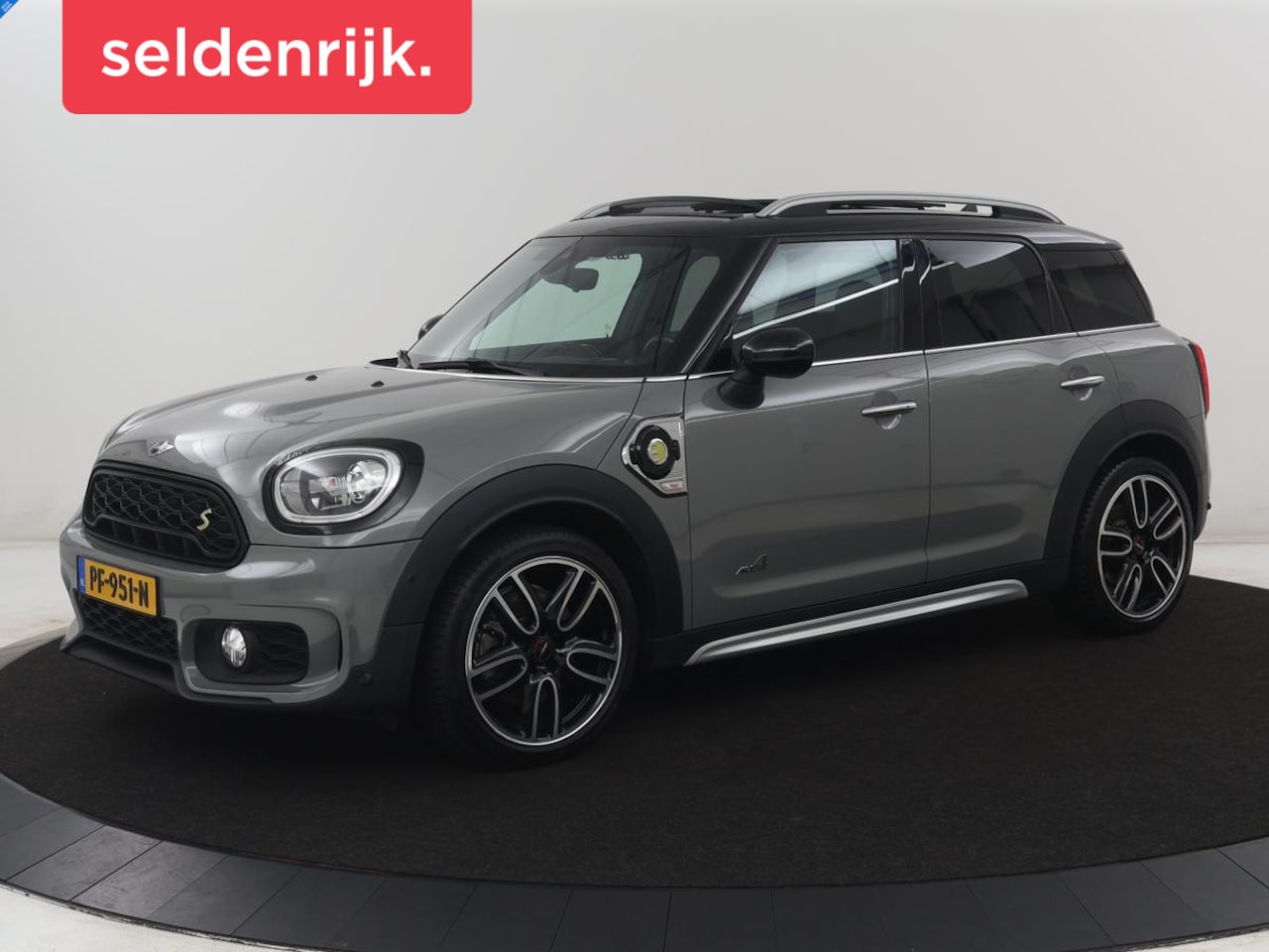 MINI Countryman - 1.5 Cooper S E ALL4 Chili | Panoramadak | Half leder | Cruise control | Head-up | Stoelver - AutoWereld.nl