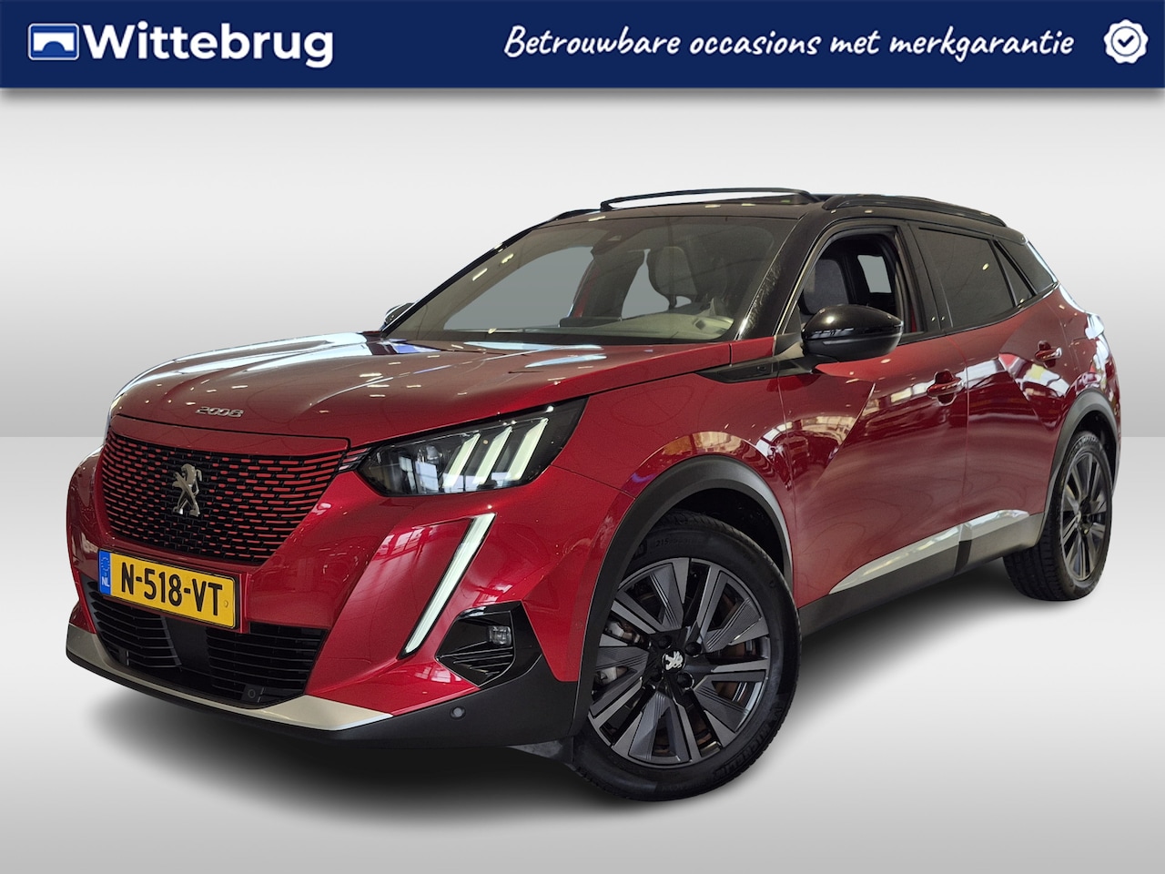 Peugeot e-2008 - EV GT Pack 50 kWh 3-Fase | Panoramisch Schuifdak | Navigatie | Camera | Dode Hoek Bewaking - AutoWereld.nl