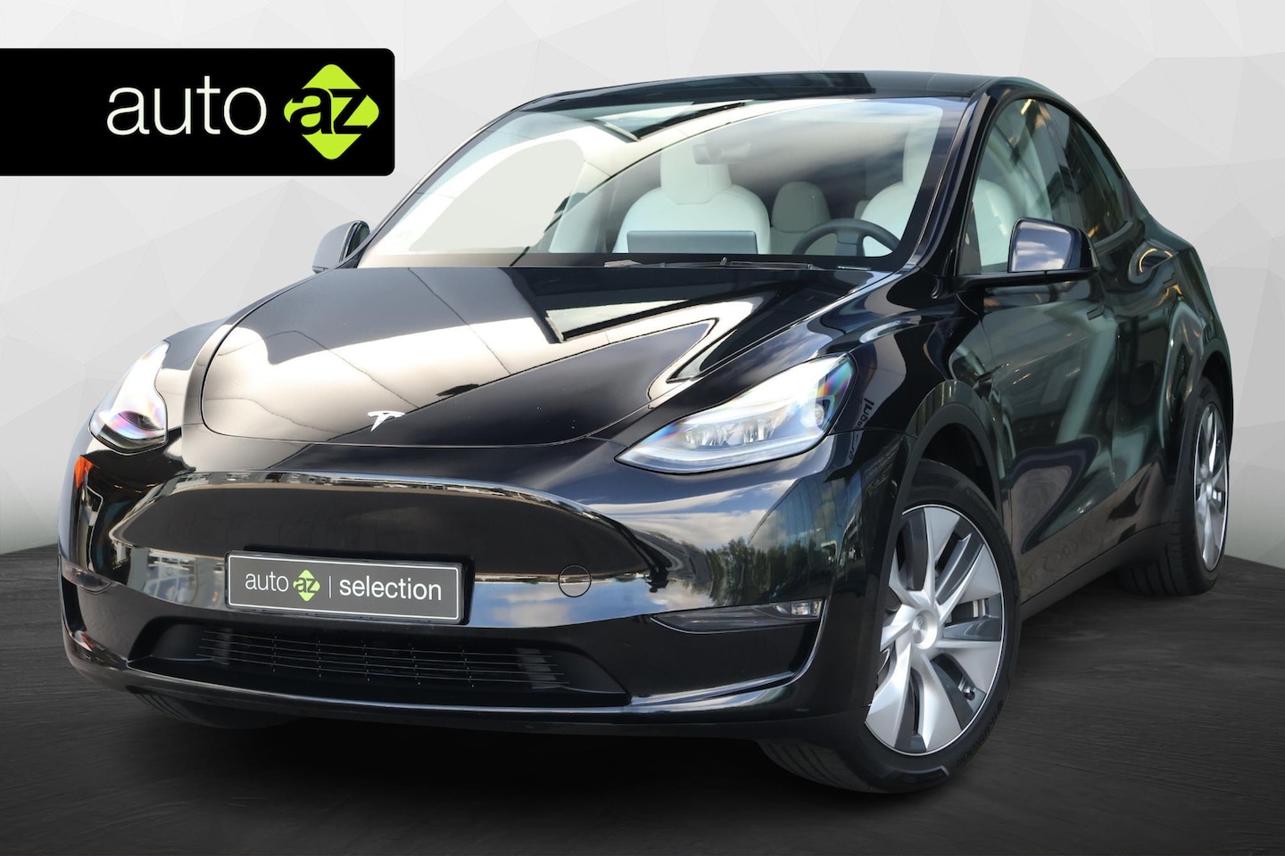 Tesla Model Y - Long Range AWD 75 kWh / Trekhaak/ Panoramadak - AutoWereld.nl
