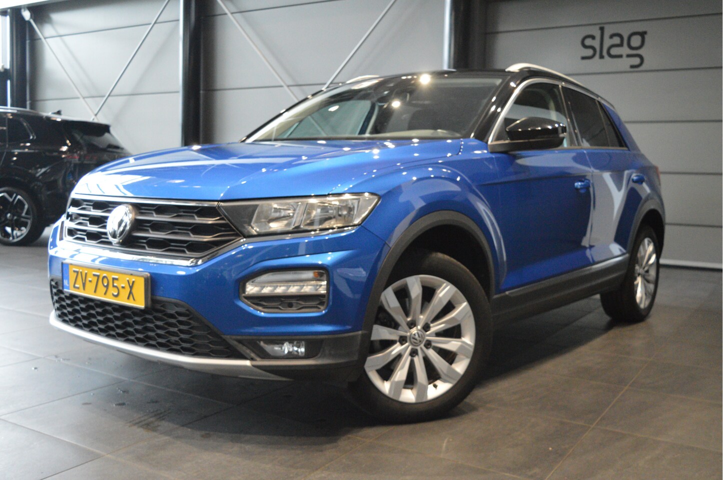 Volkswagen T-Roc - 1.0 TSI Style navi clima cruise pdc trekhaak 17 inch !! - AutoWereld.nl