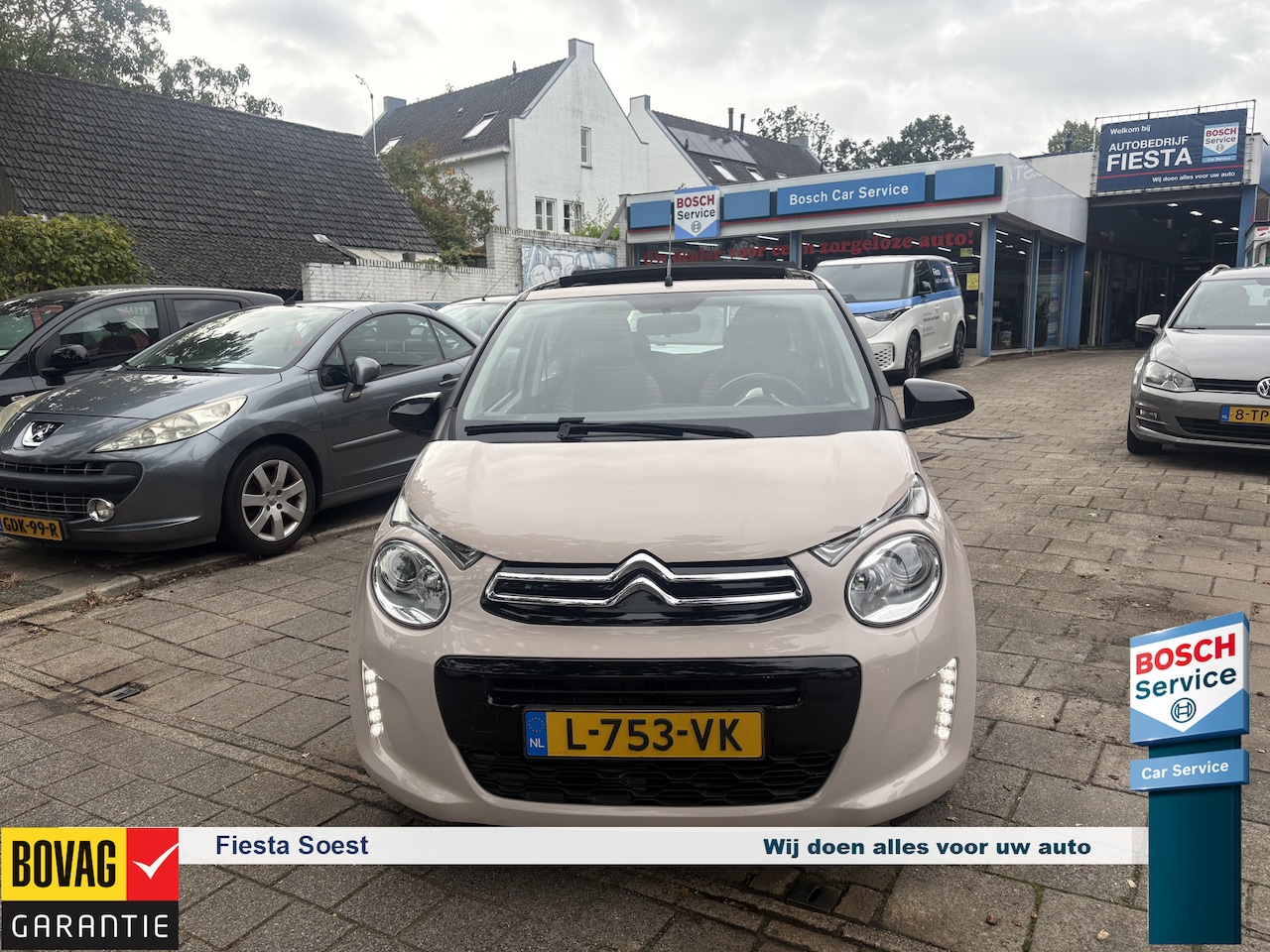 Citroën C1 - 1.0 VTi Airscape Shine Groot open dak met airco en cruise controle  en apple carplay - AutoWereld.nl